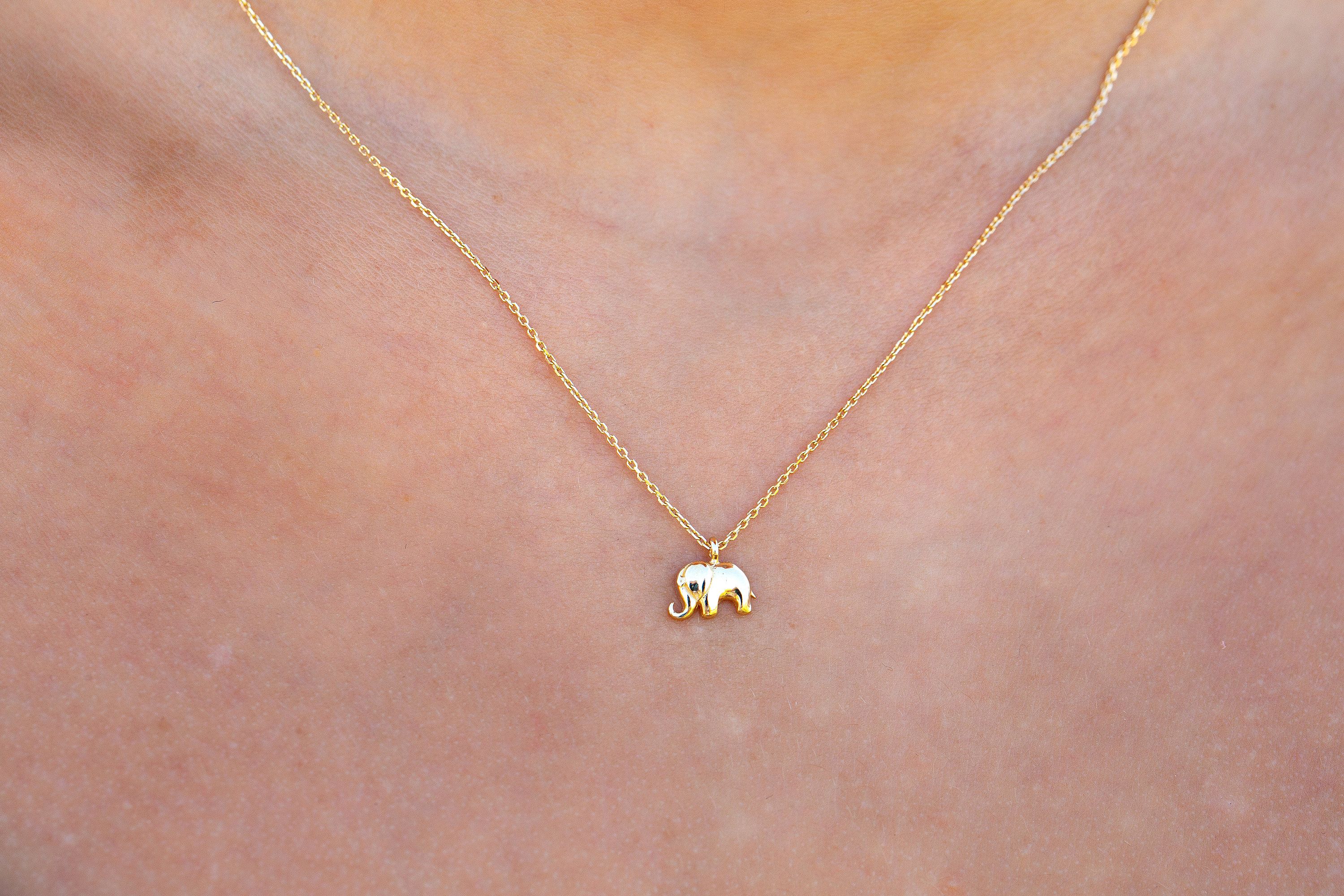 14k gold elephant pendant