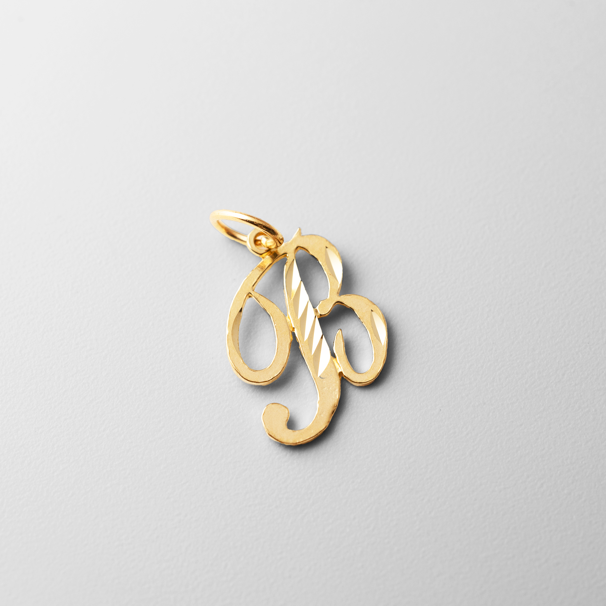 Gold Cursive Letter B Pendant | A-Z Pendants - Charlie & Co. Jewelry