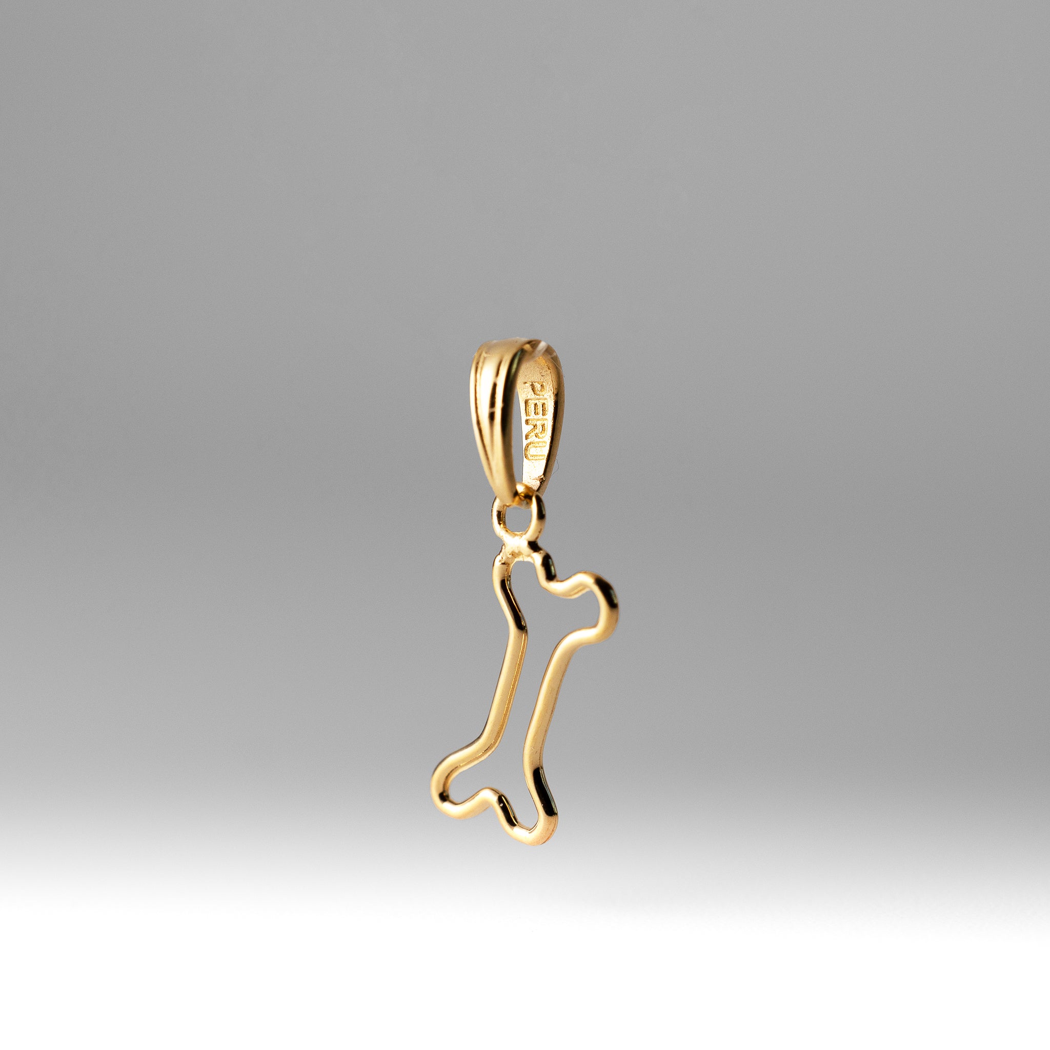 Gold Cut-Out Dog Bone Pendant - Charlie & Co. Jewelry