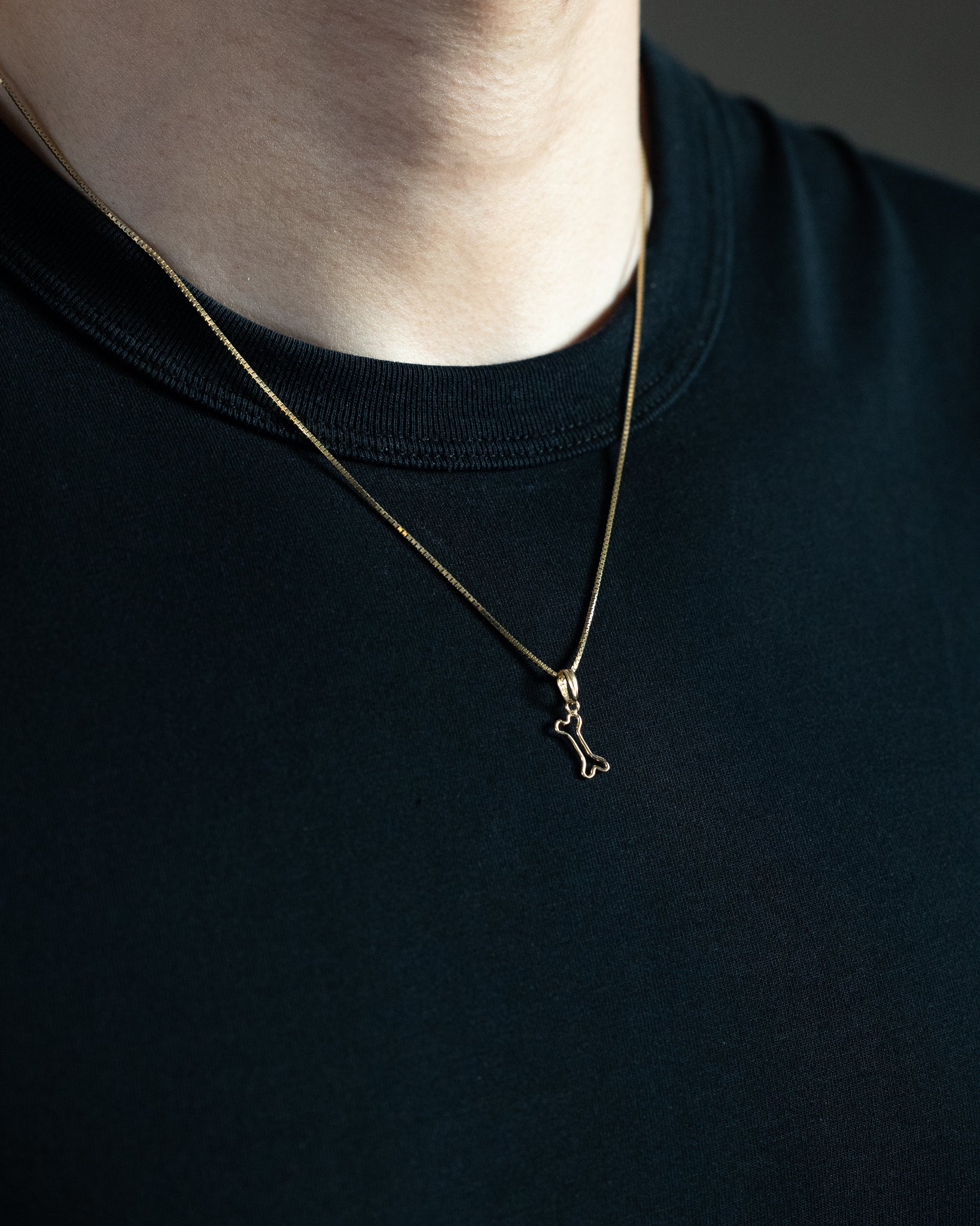 Gold Cut-Out Dog Bone Pendant - Charlie & Co. Jewelry