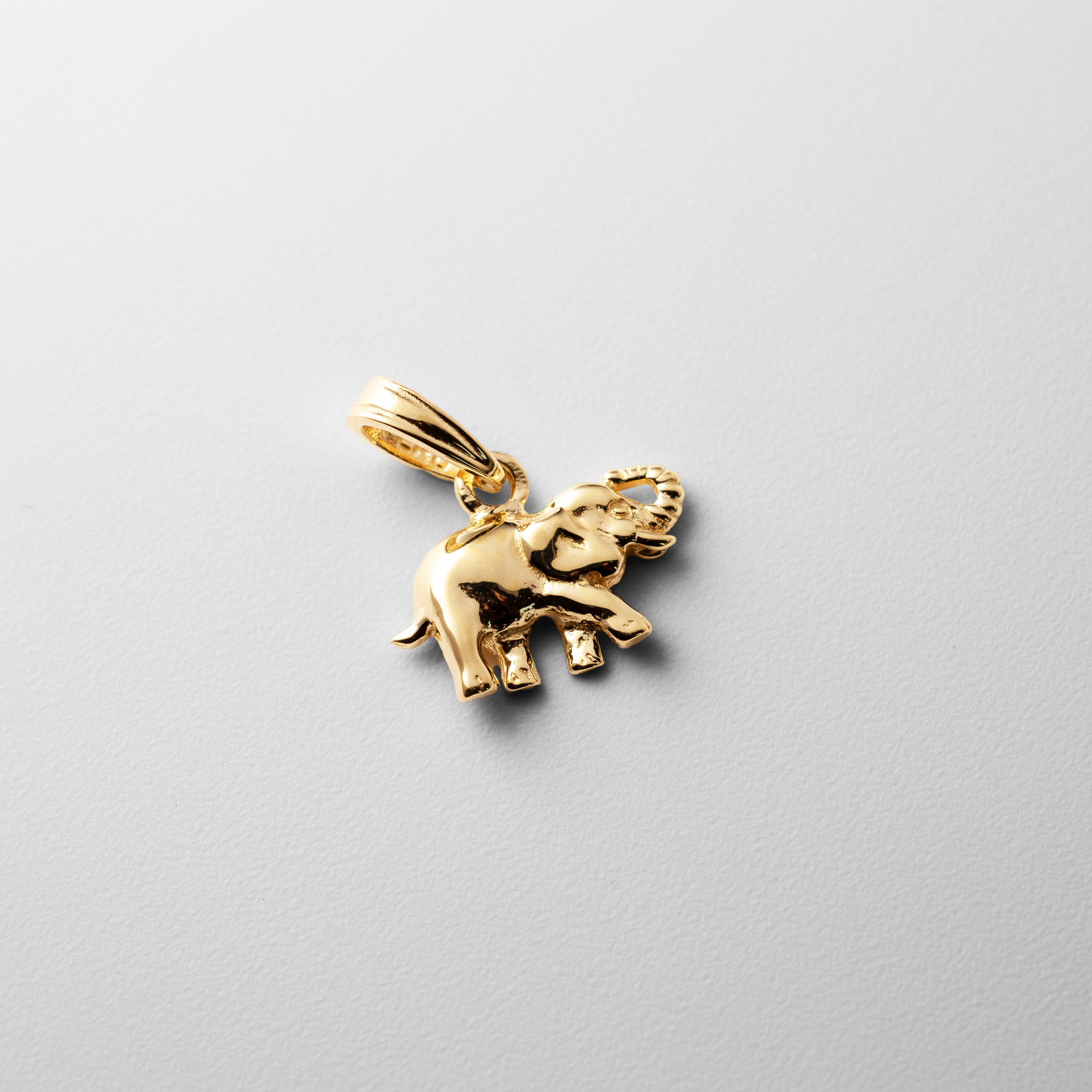 Gold Polished Mini Elephant Pendant - Charlie & Co. Jewelry