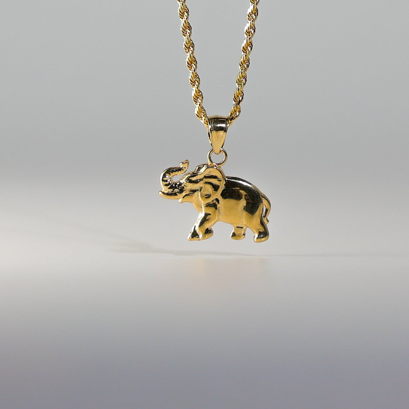 Gold Dainty Elephant Charm Model-1627 - Charlie & Co. Jewelry