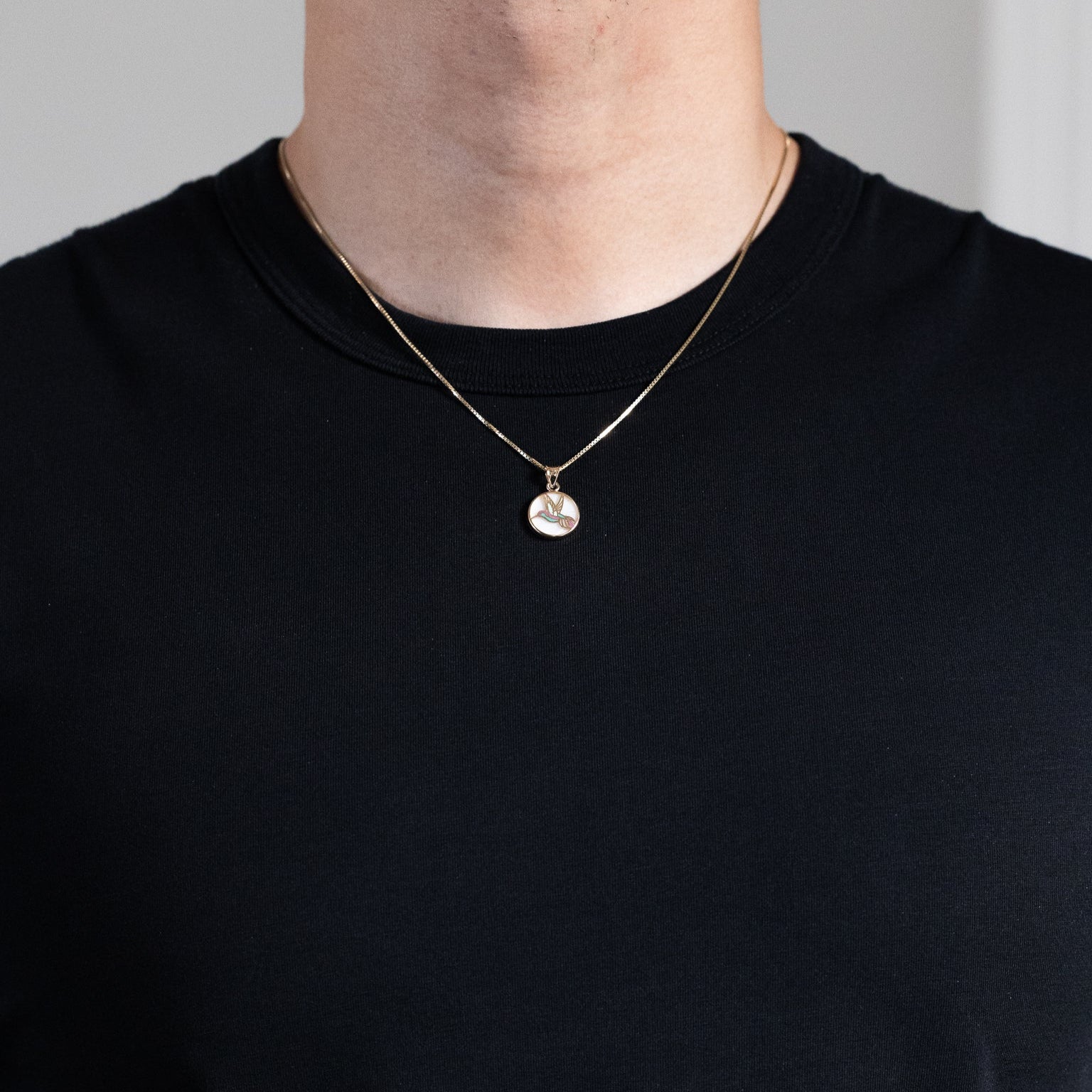 Gold Hummingbird Round Pendant With Mother of Pearl Backdrop - Model PT2519 - Charlie & Co. Jewelry