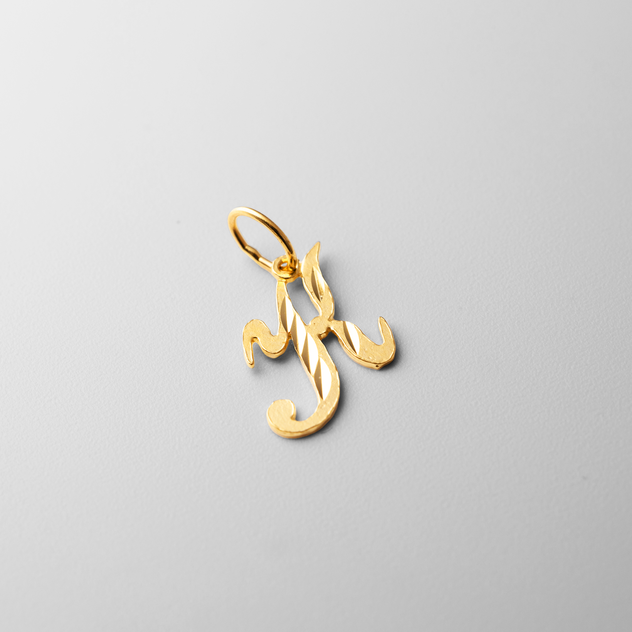 Gold Calligraphy Letter K Pendant | A-Z Pendants - Charlie & Co. Jewelry