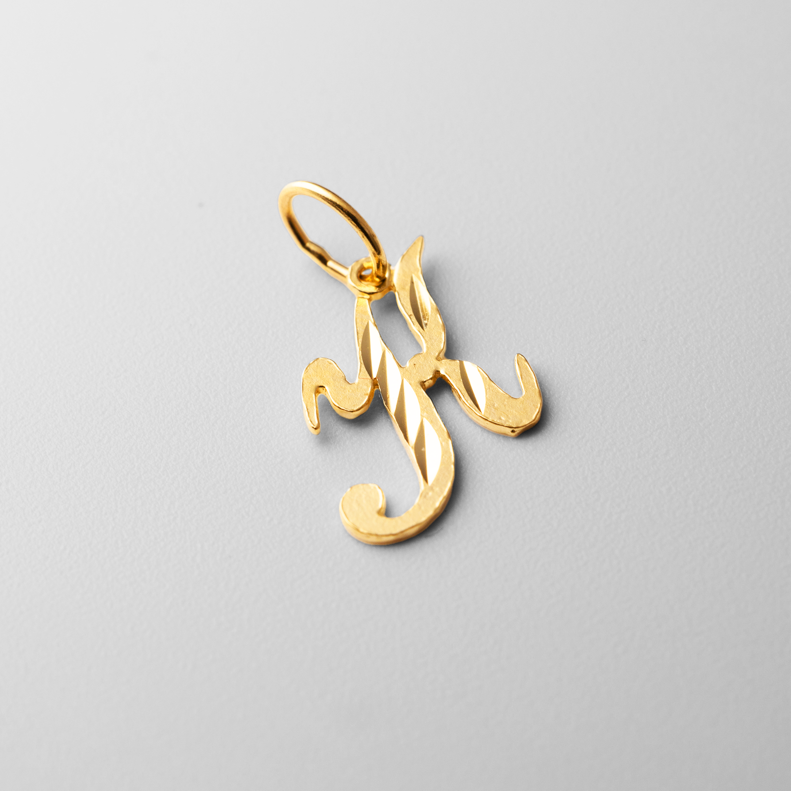 Gold Calligraphy Letter K Pendant | A-Z Pendants - Charlie & Co. Jewelry