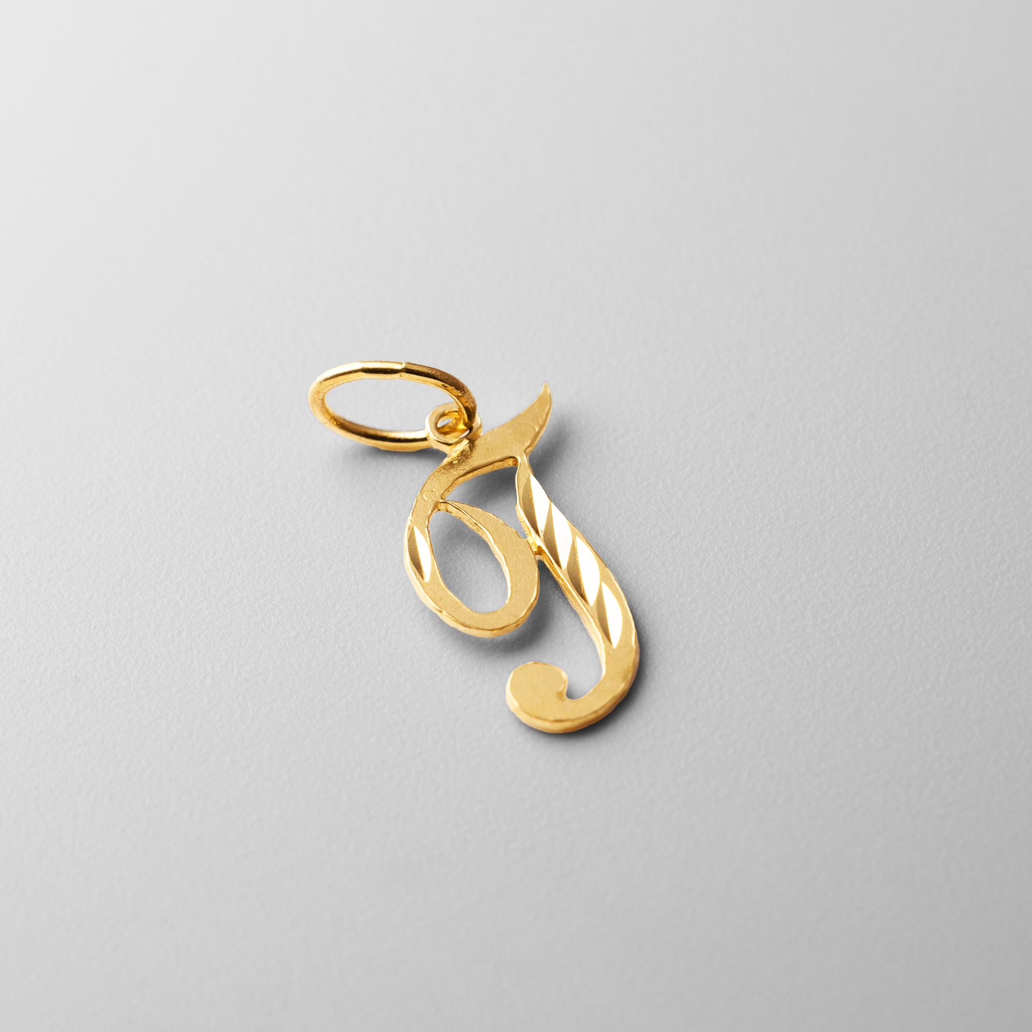 Gold Calligraphy Letter T Pendant | A-Z Pendants - Charlie & Co. Jewelry