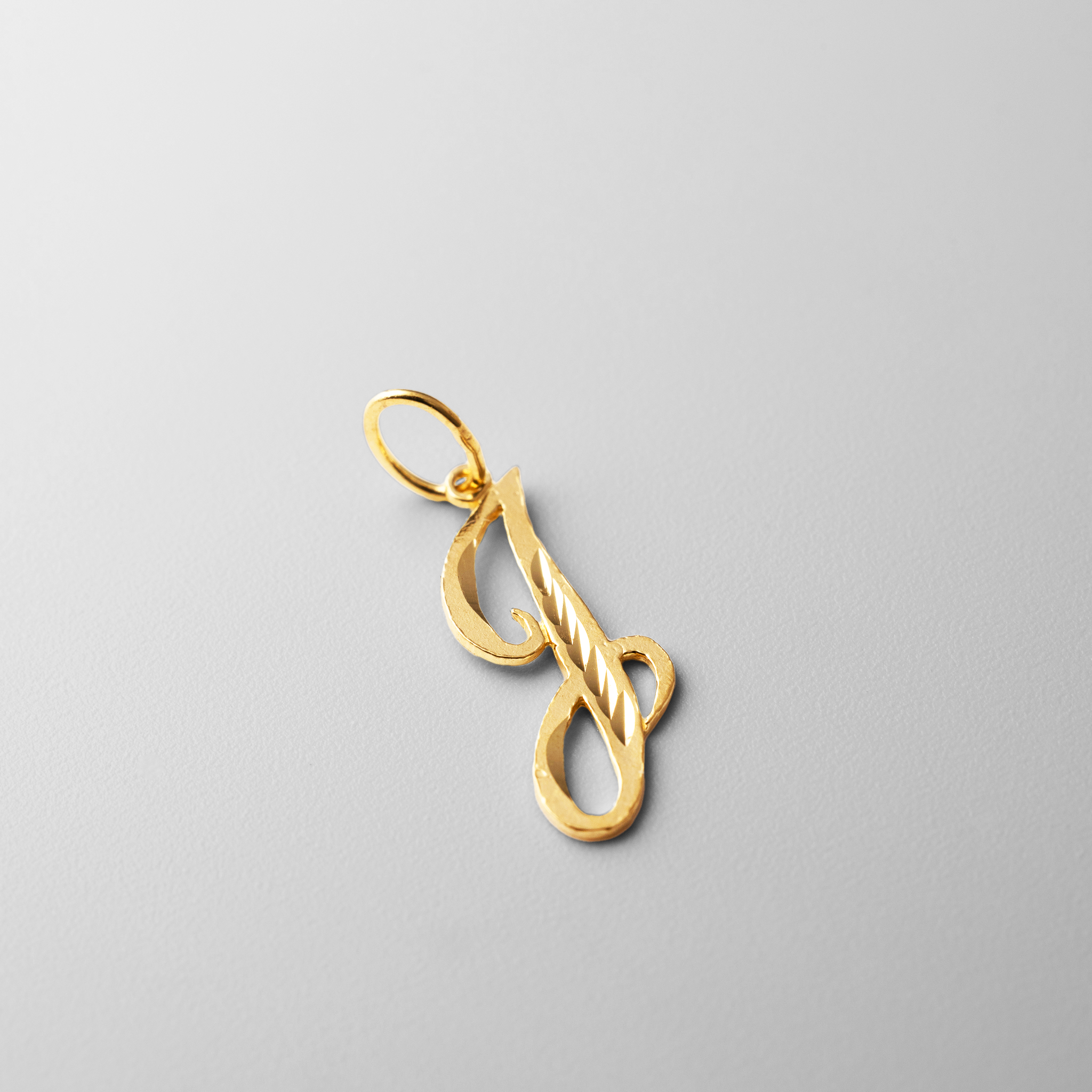 Gold Calligraphy Letter J Pendant | A-Z Pendants - Charlie & Co. Jewelry