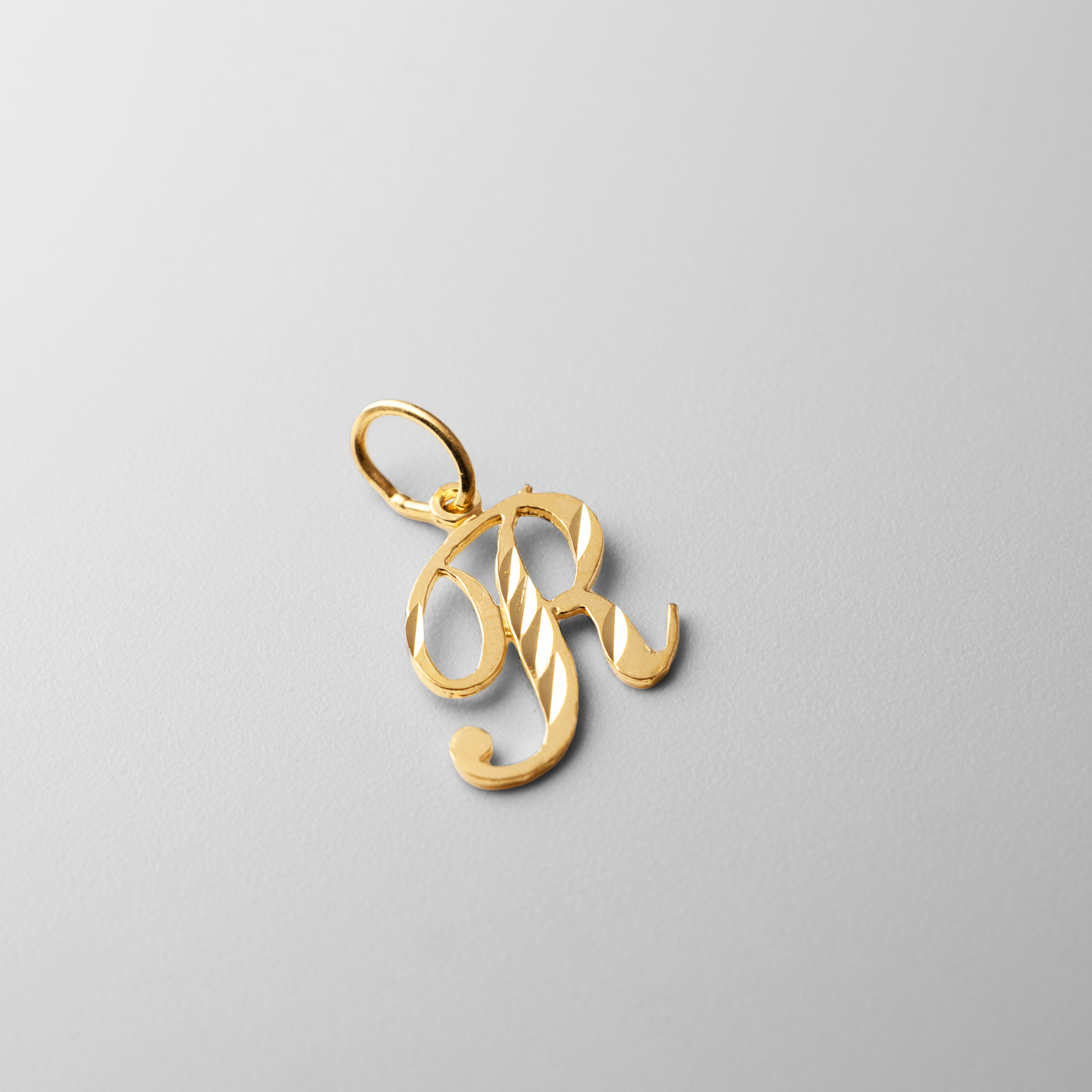 Gold Calligraphy Letter R Pendant | A-Z Pendants - Charlie & Co. Jewelry