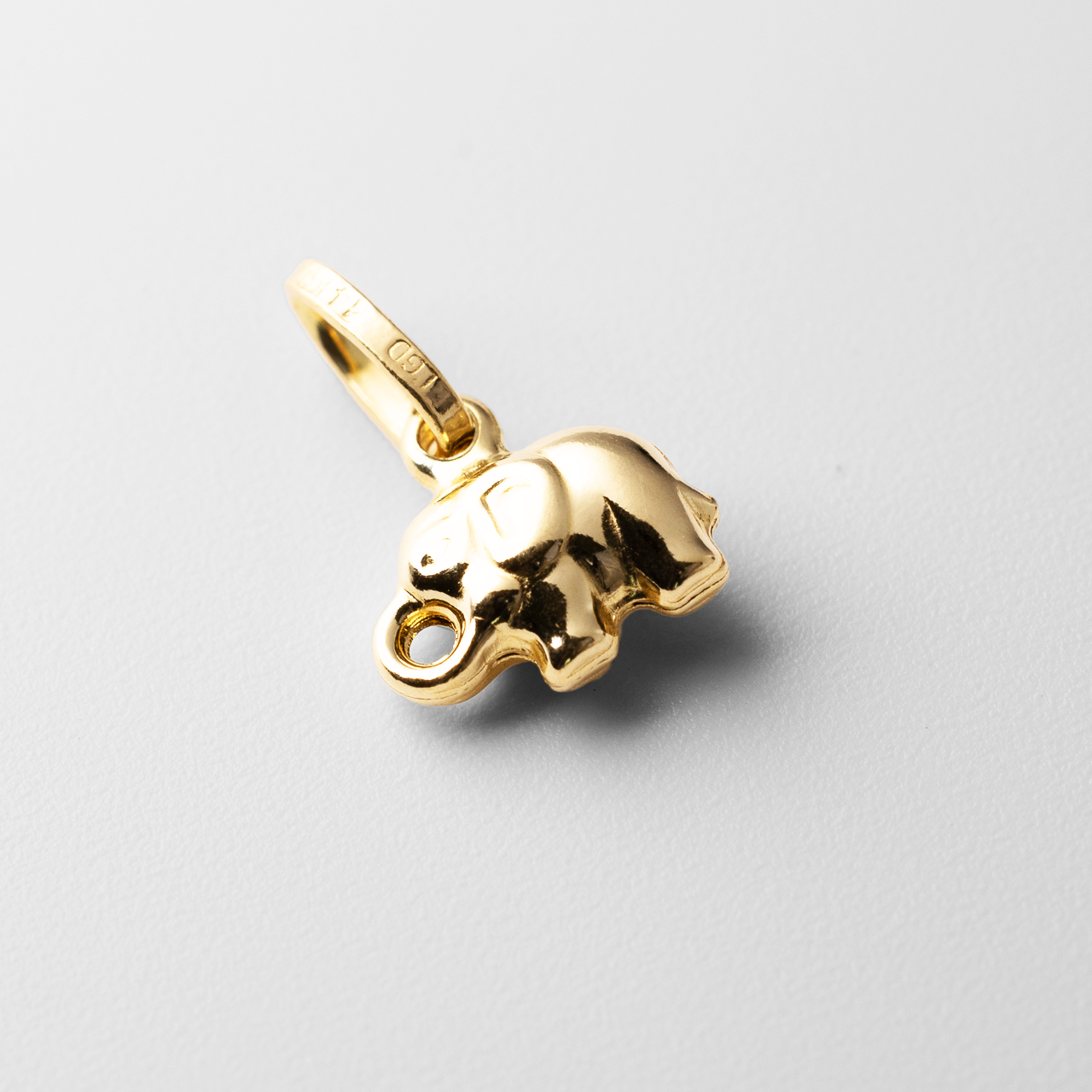 Gold Tiny Elephant Charm Model-493 - Charlie & Co. Jewelry