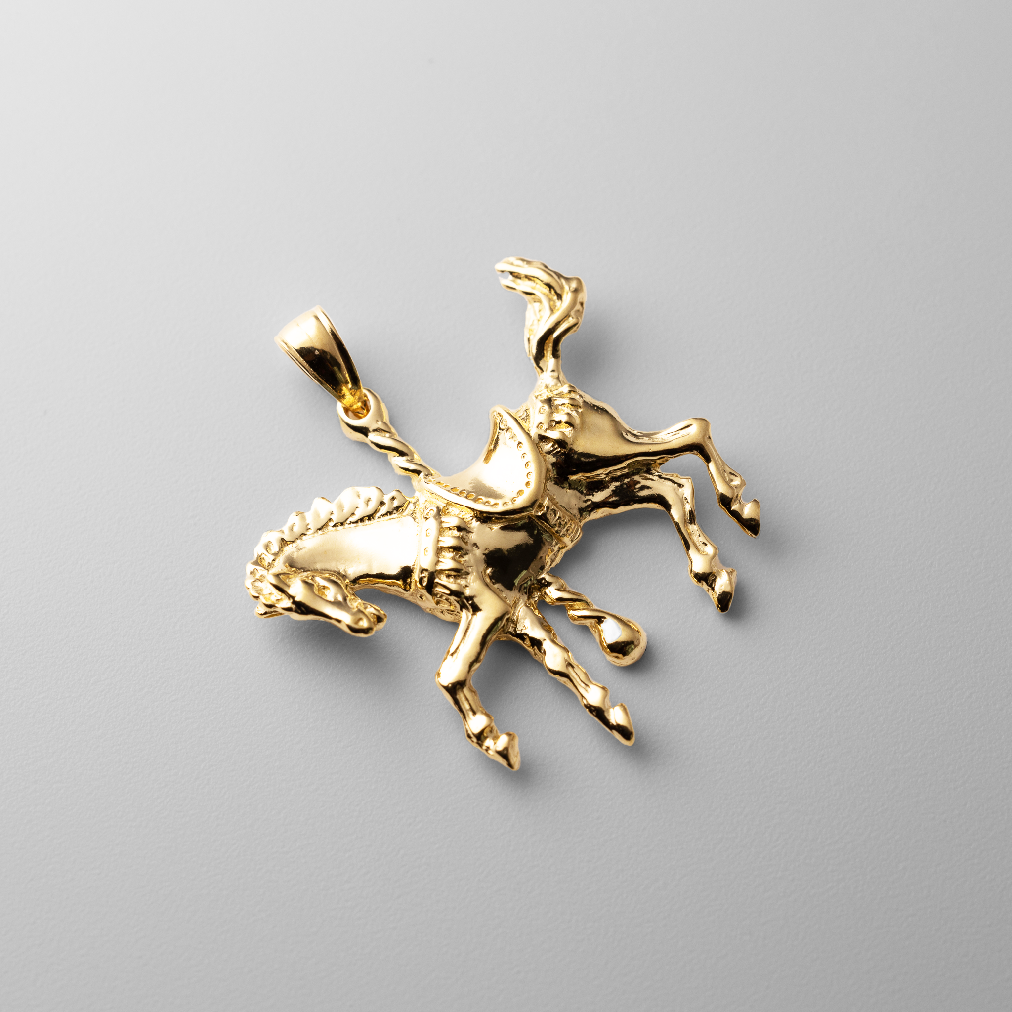 Gold Carousel Horse with Tail Up Pendant - Charlie & Co. Jewelry