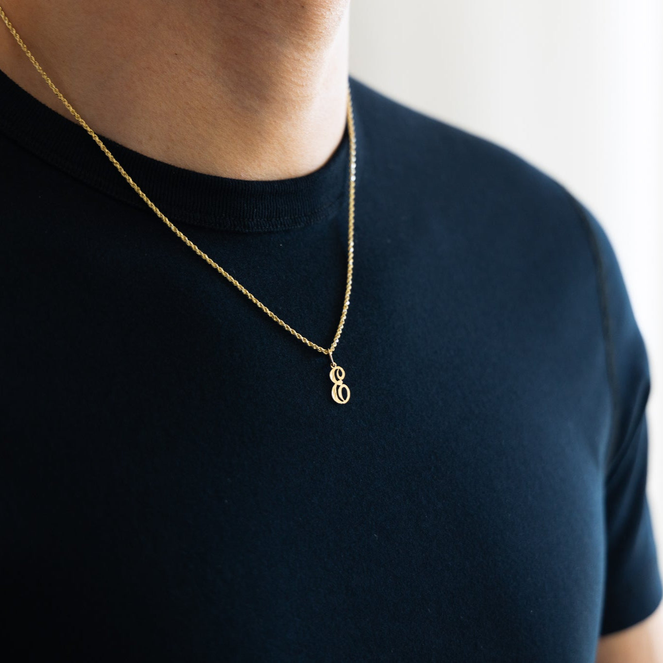 Gold Calligraphy Letter E Pendant | A-Z Pendants - Charlie & Co. Jewelry