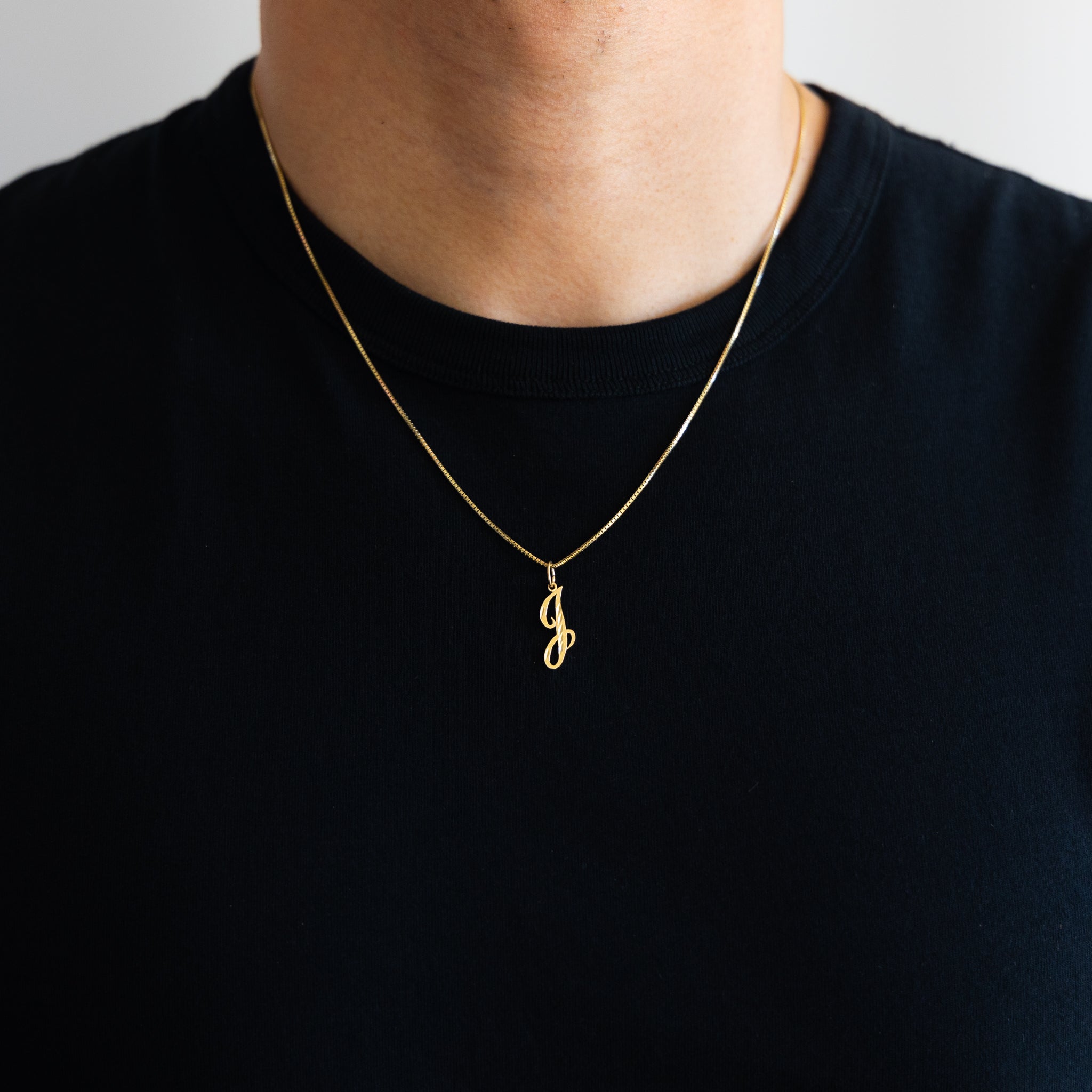 Gold Calligraphy Letter J Pendant | A-Z Pendants - Charlie & Co. Jewelry