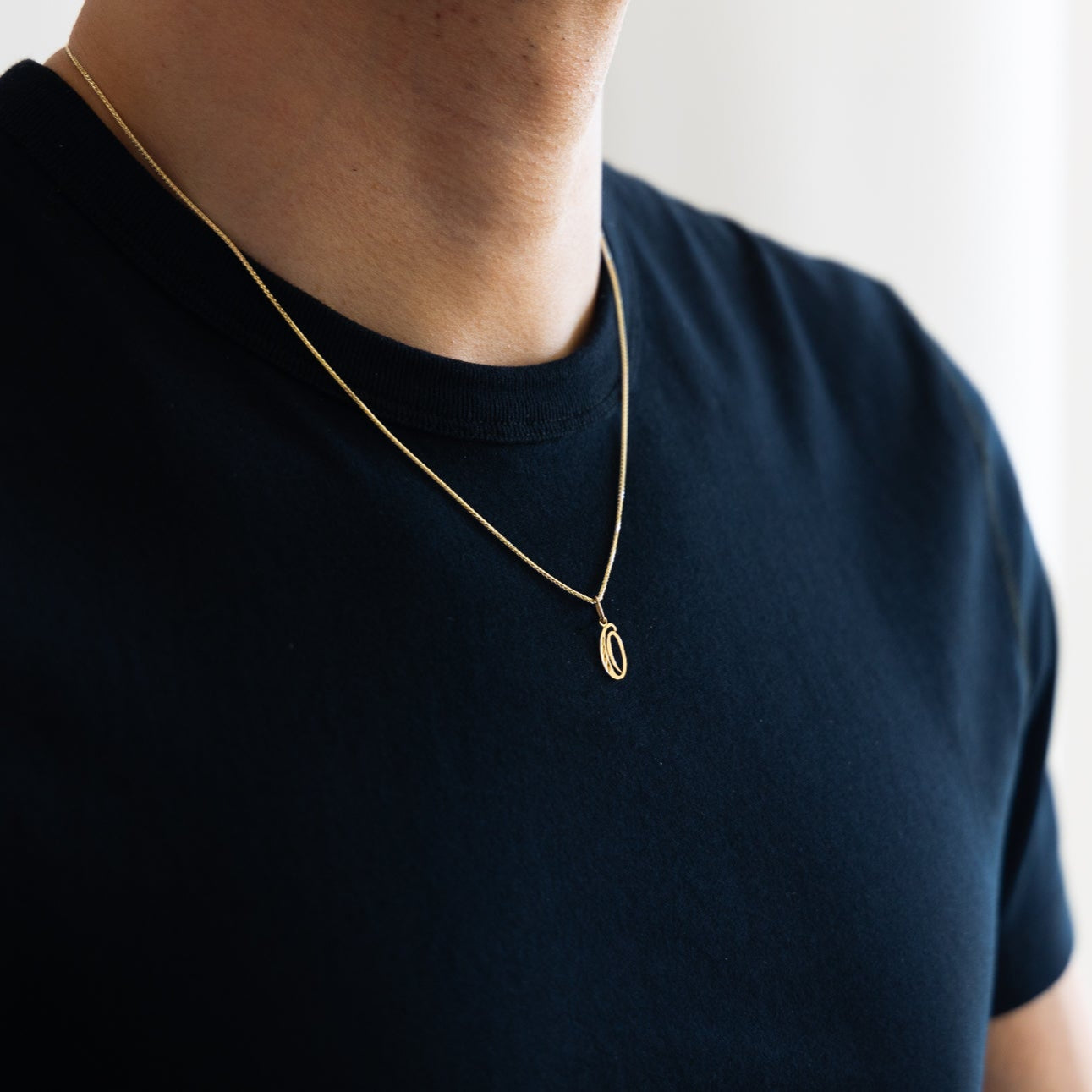 Gold Calligraphy Letter O Pendant | A-Z Pendants - Charlie & Co. Jewelry