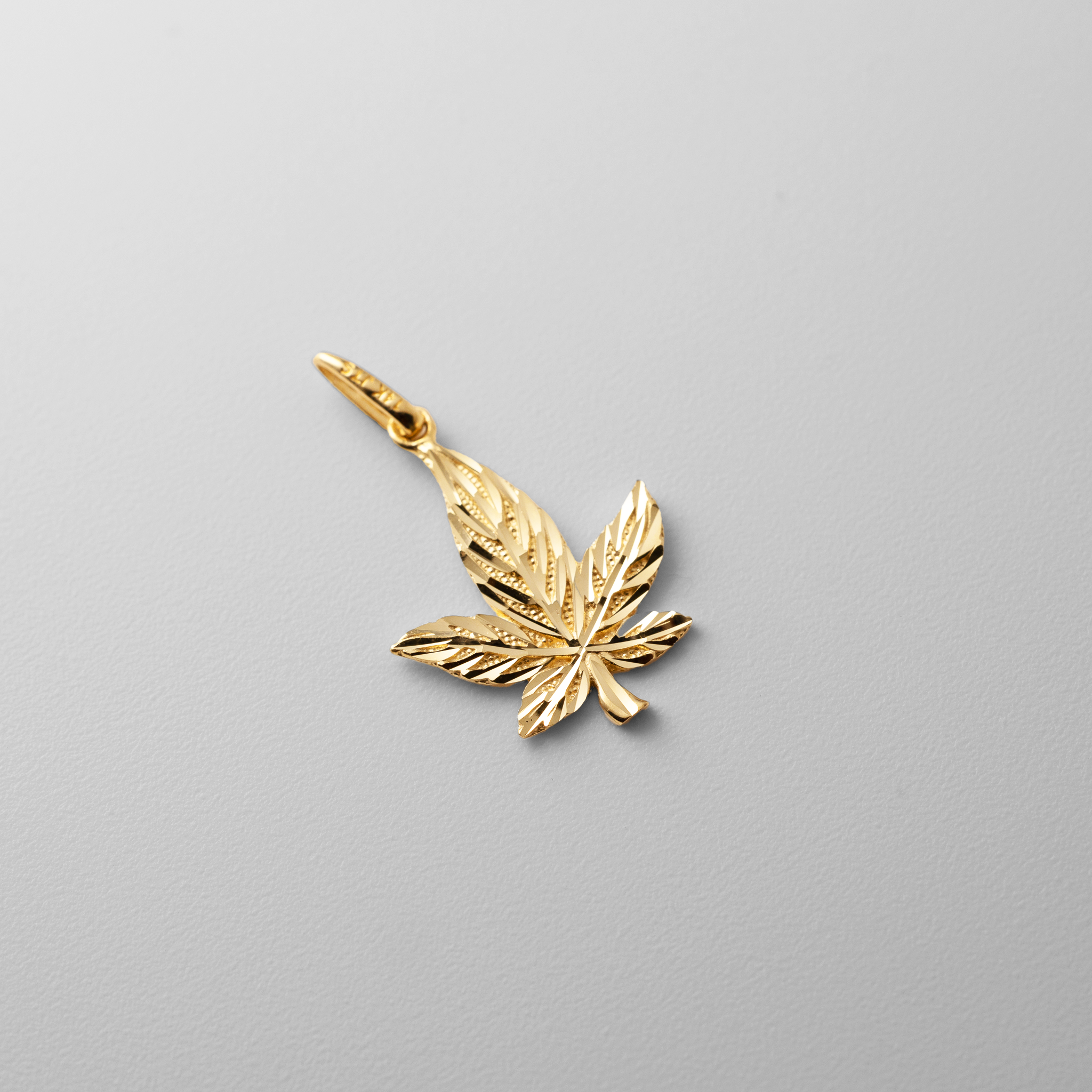 Gold Diamond-Cut Cannabis Leaf Charm - Model C4645 - Charlie & Co. Jewelry