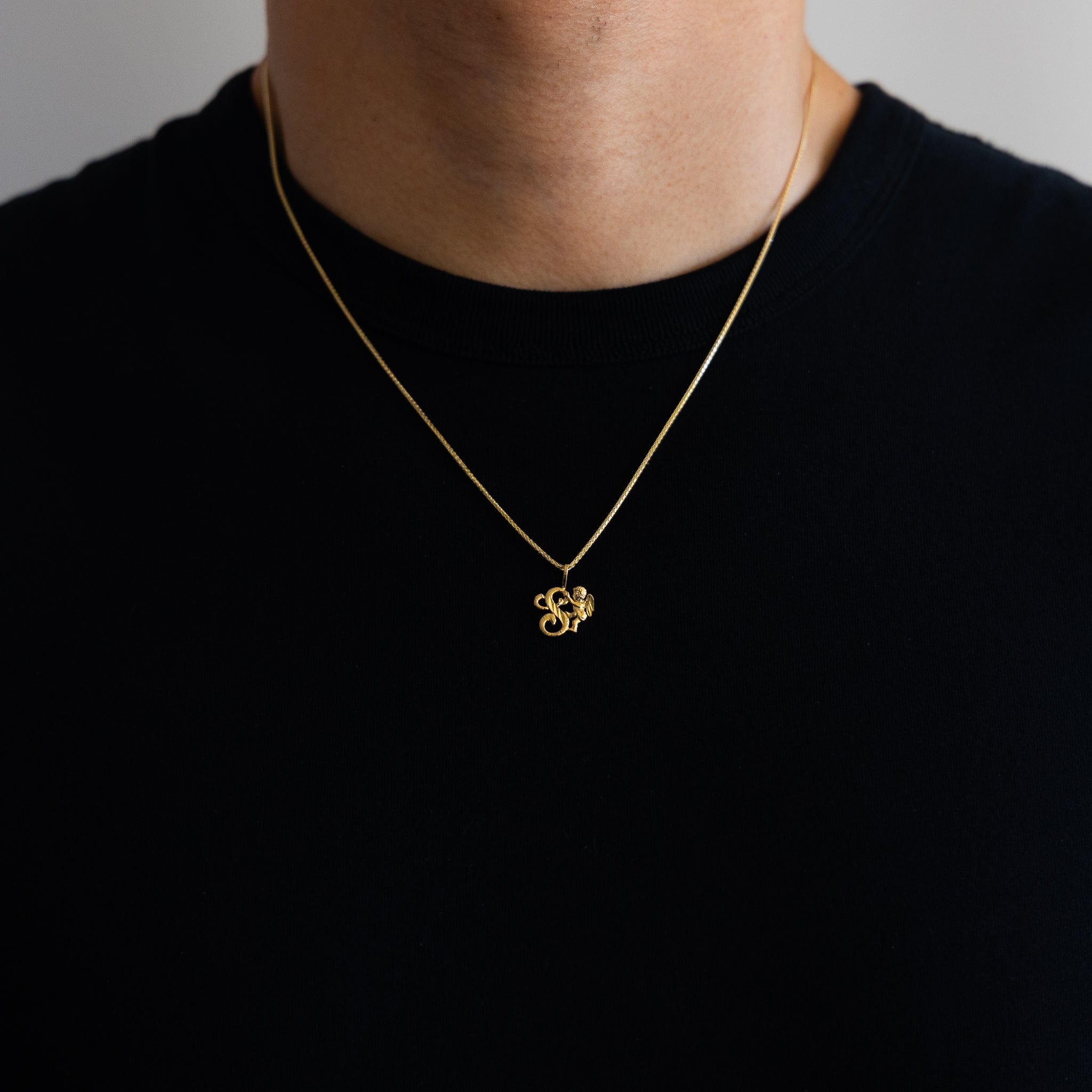 Gold Angel Letter S Pendant | A-Z Pendants - Charlie & Co. Jewelry