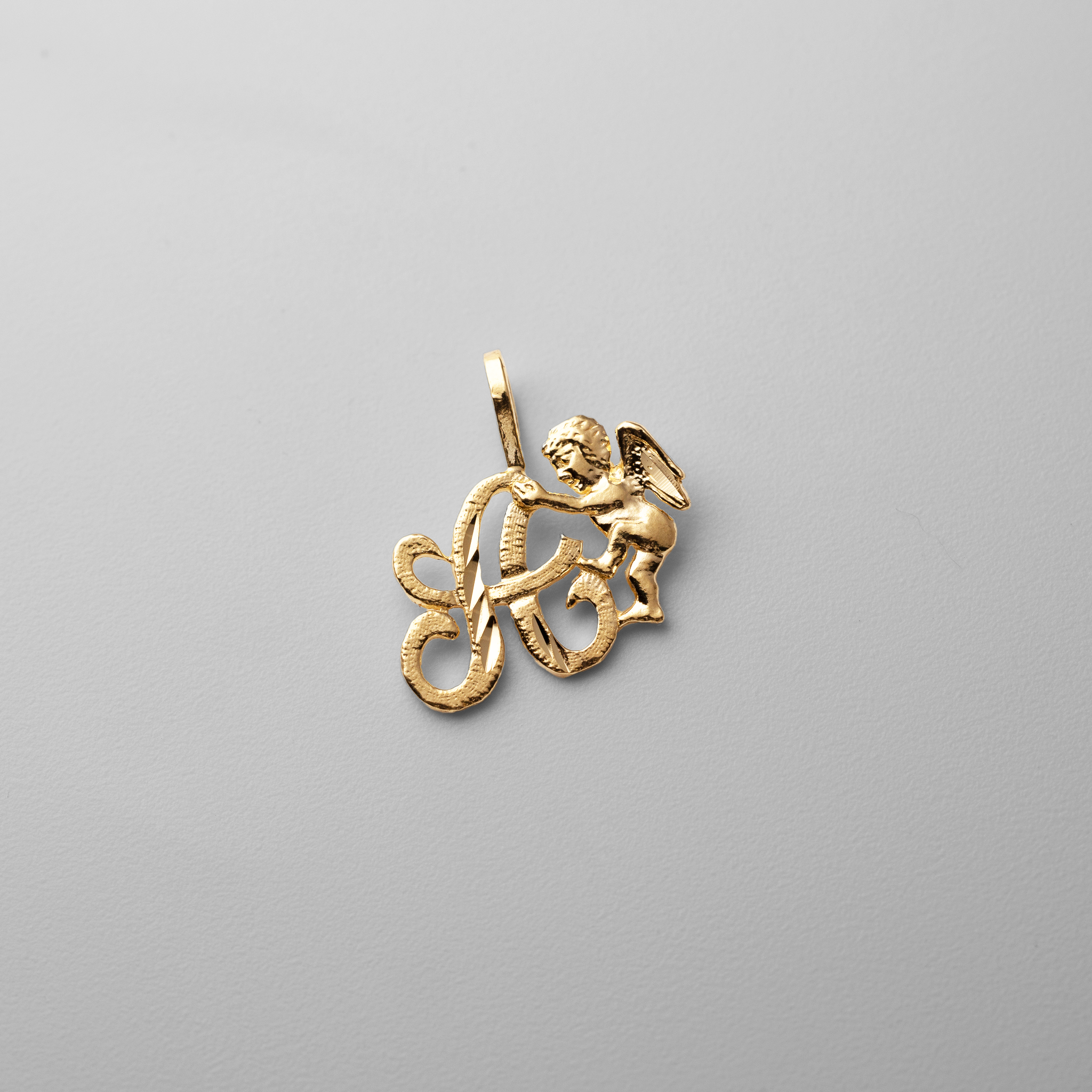 Gold Script Letter A Pendant with Cherub Angel | A-Z Pendants - Charlie & Co. Jewelry