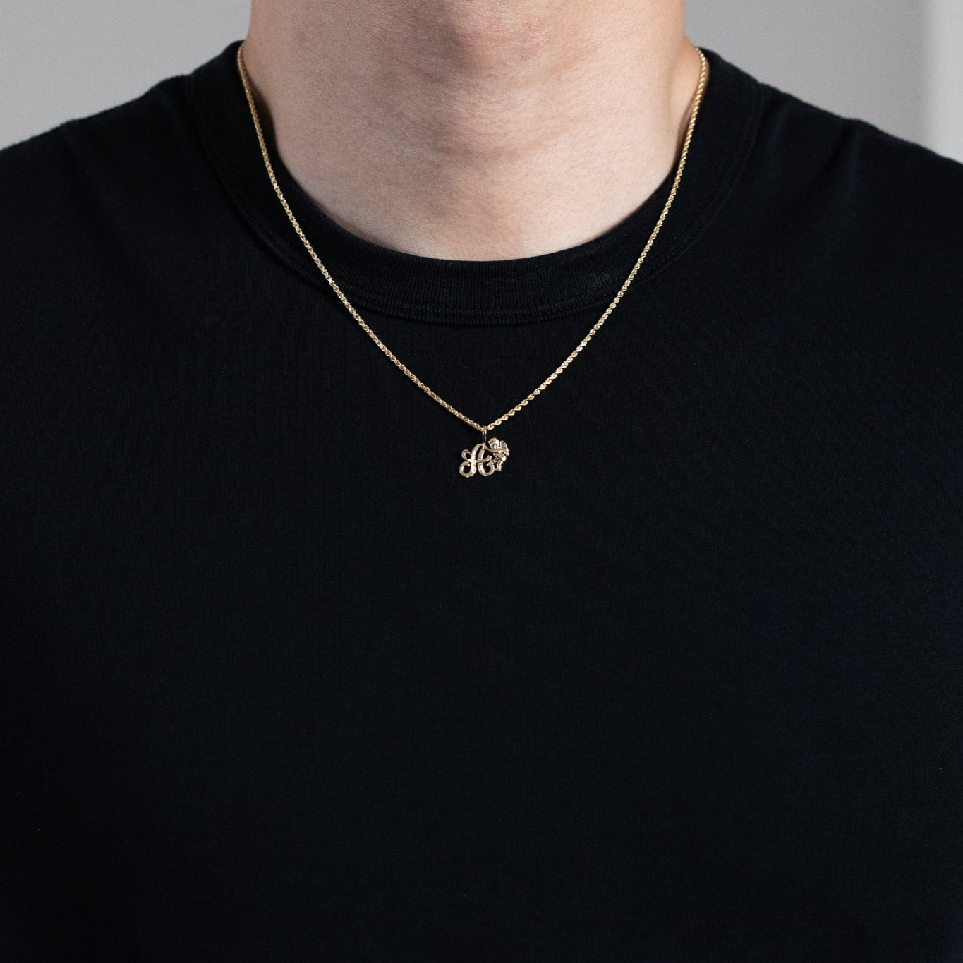Gold Script Letter A Pendant with Cherub Angel | A-Z Pendants - Charlie & Co. Jewelry