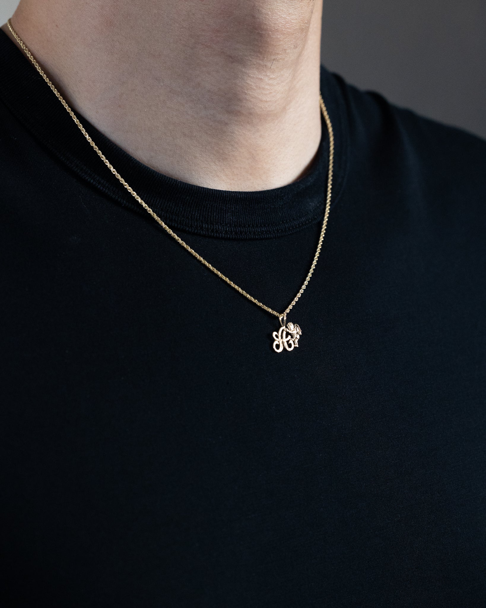 Gold Script Letter A Pendant with Cherub Angel | A-Z Pendants - Charlie & Co. Jewelry