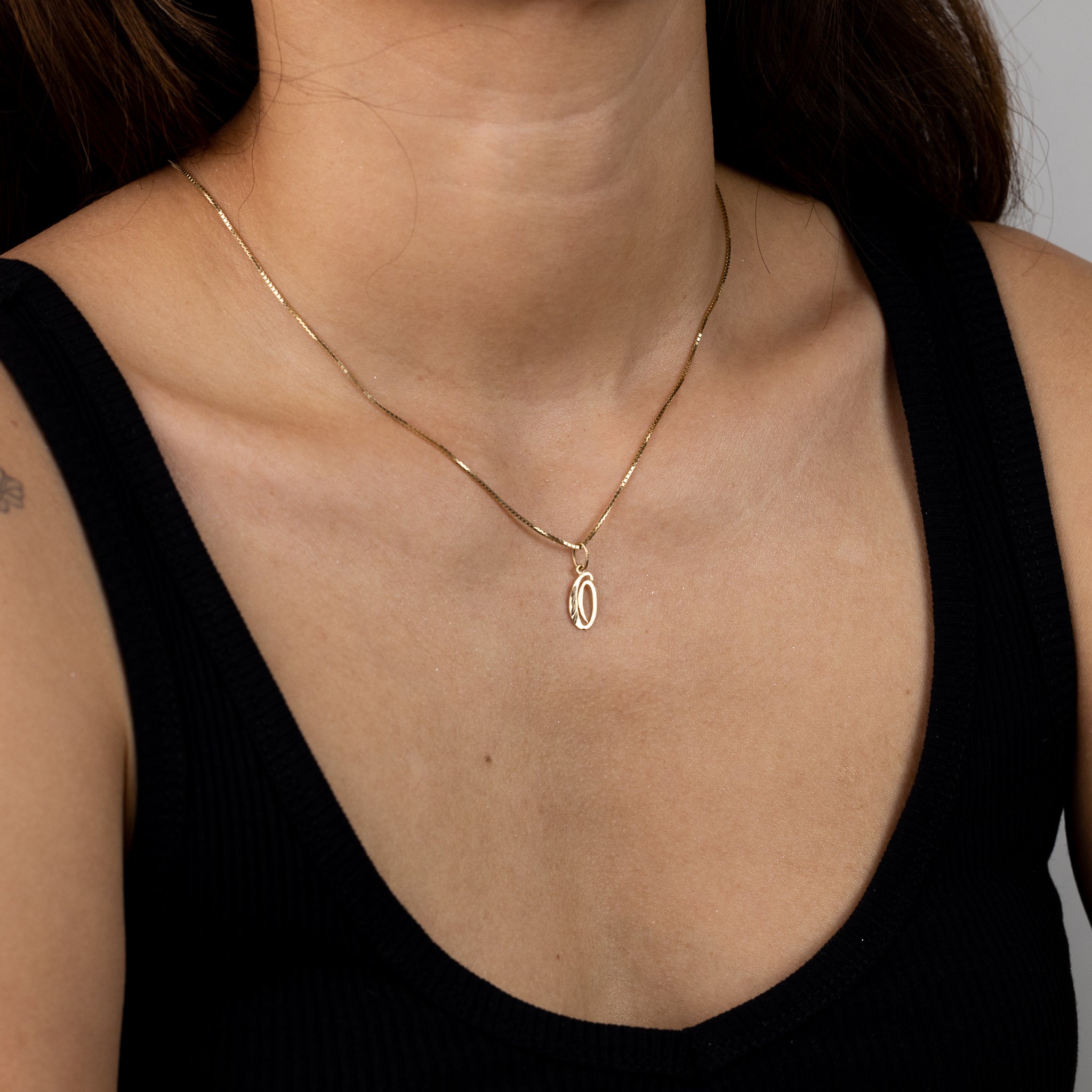 Gold Cursive Letter O Pendant | A-Z Pendants - Charlie & Co. Jewelry