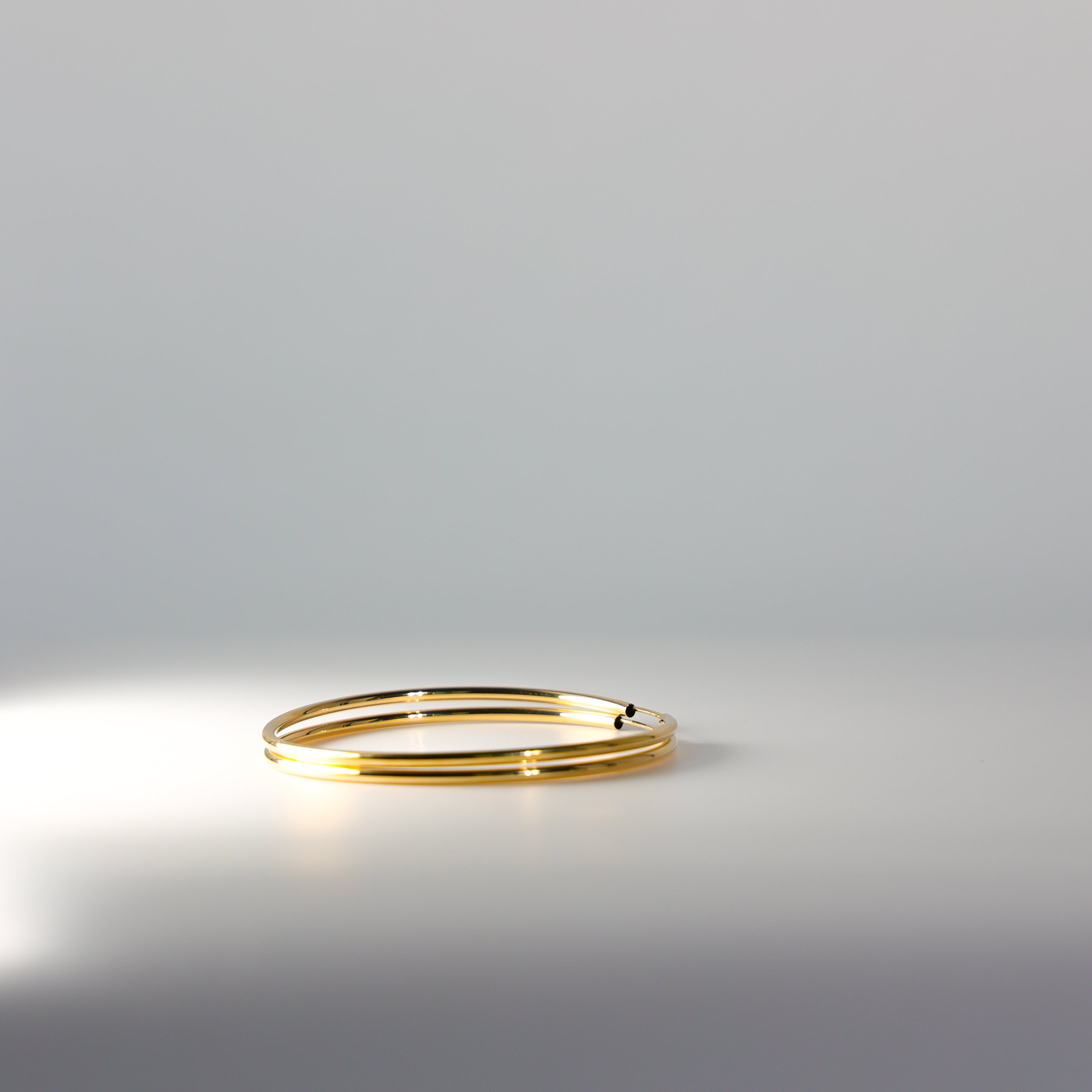 Gold 2mm Endless Hoop Earrings (55mm) - Model 126 - Charlie & Co. Jewelry