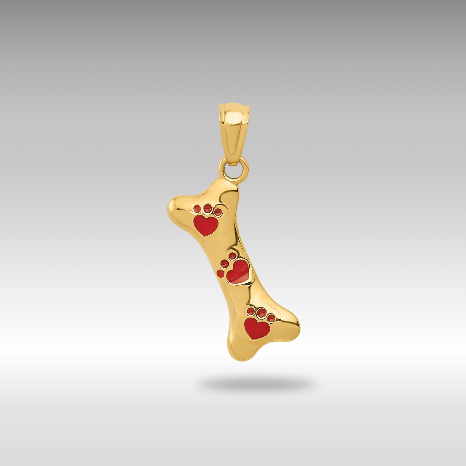 Yellow Gold Dog Bone Pendant with Red Enamel Paw Prints - Charlie & Co. Jewelry