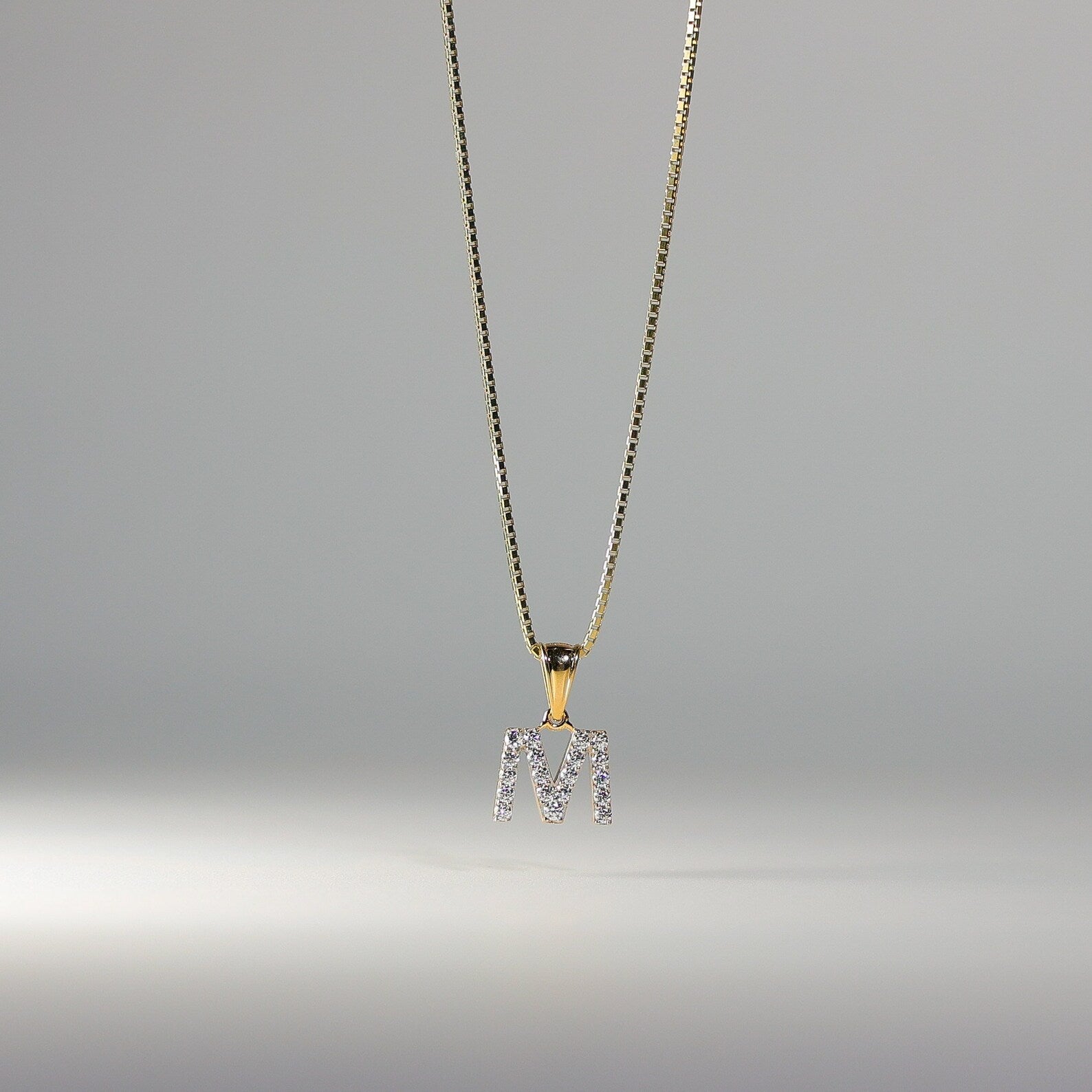 Gold Cubic Zirconia Letter M Pendant | A-Z Pendants - Charlie & Co. Jewelry