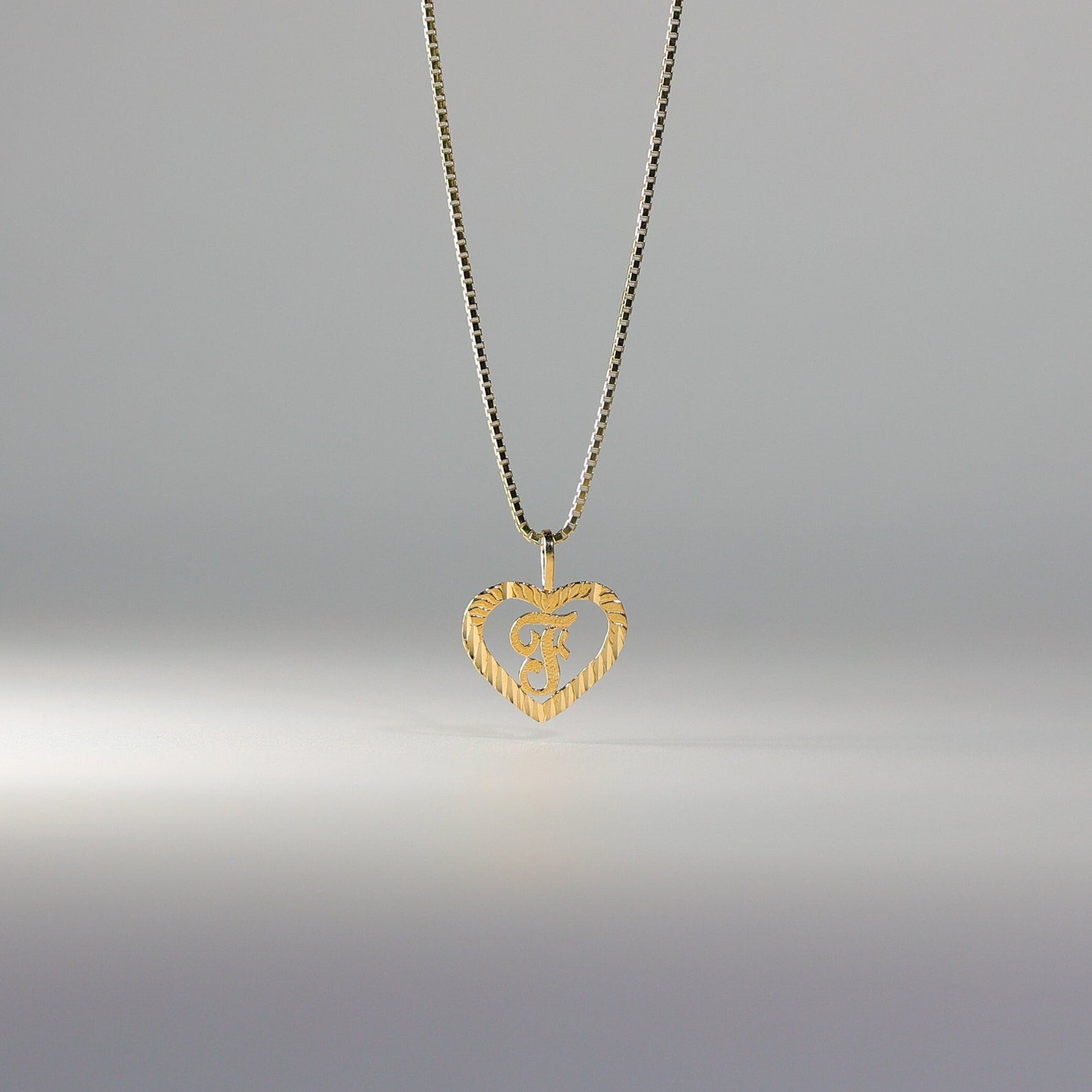 Gold Heart-Shaped Letter F Pendant | A-Z Pendants - Charlie & Co. Jewelry