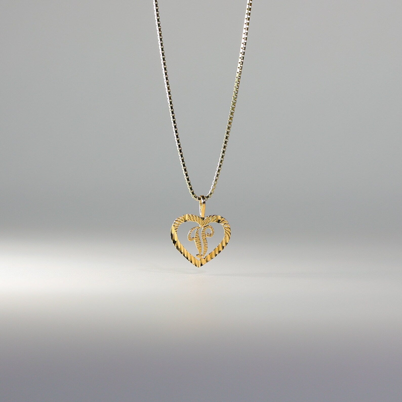 Gold Heart-Shaped Letter V Pendant | A-Z Pendants - Charlie & Co. Jewelry