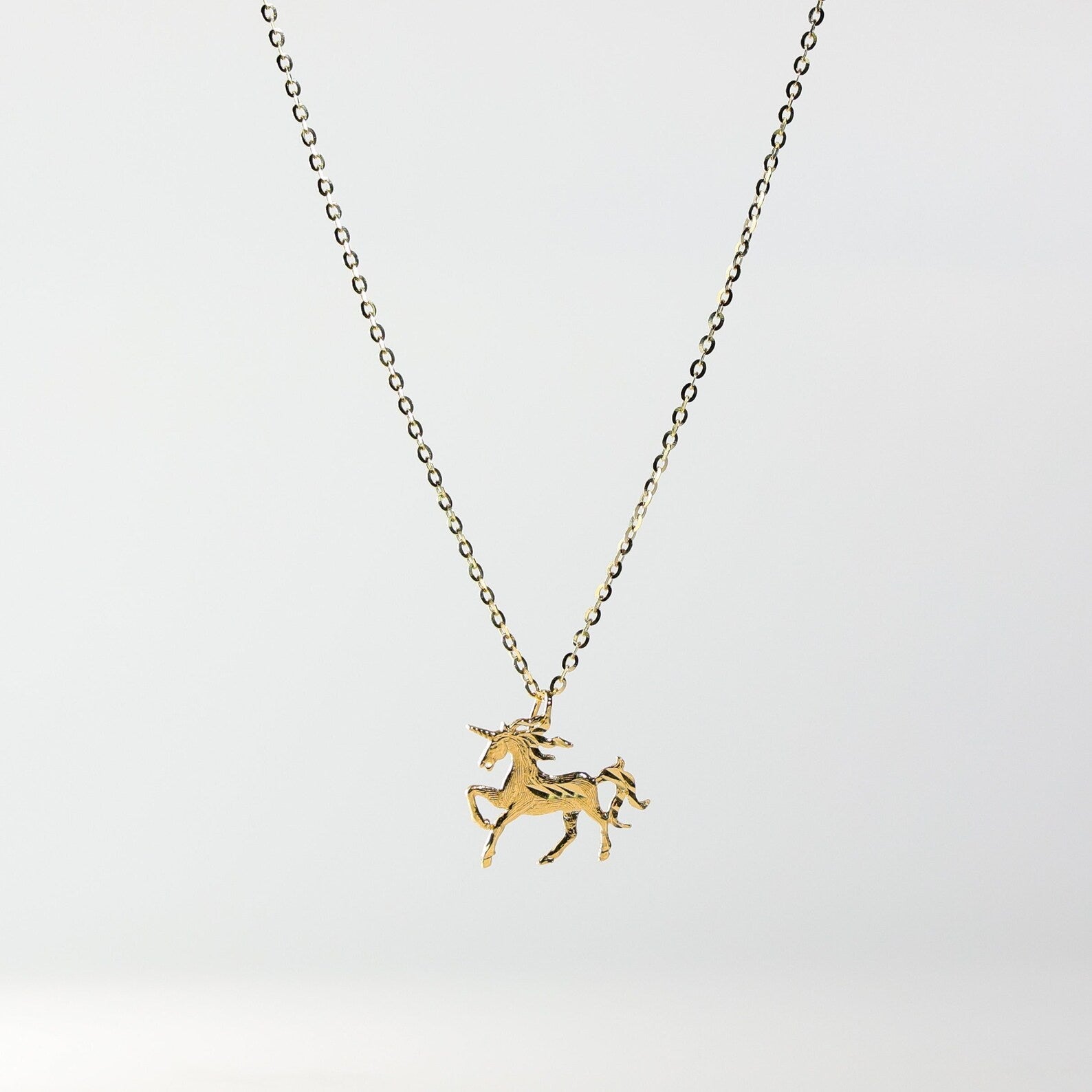 Gold Dainty Unicorn Pendant Model-1650 - Charlie & Co. Jewelry