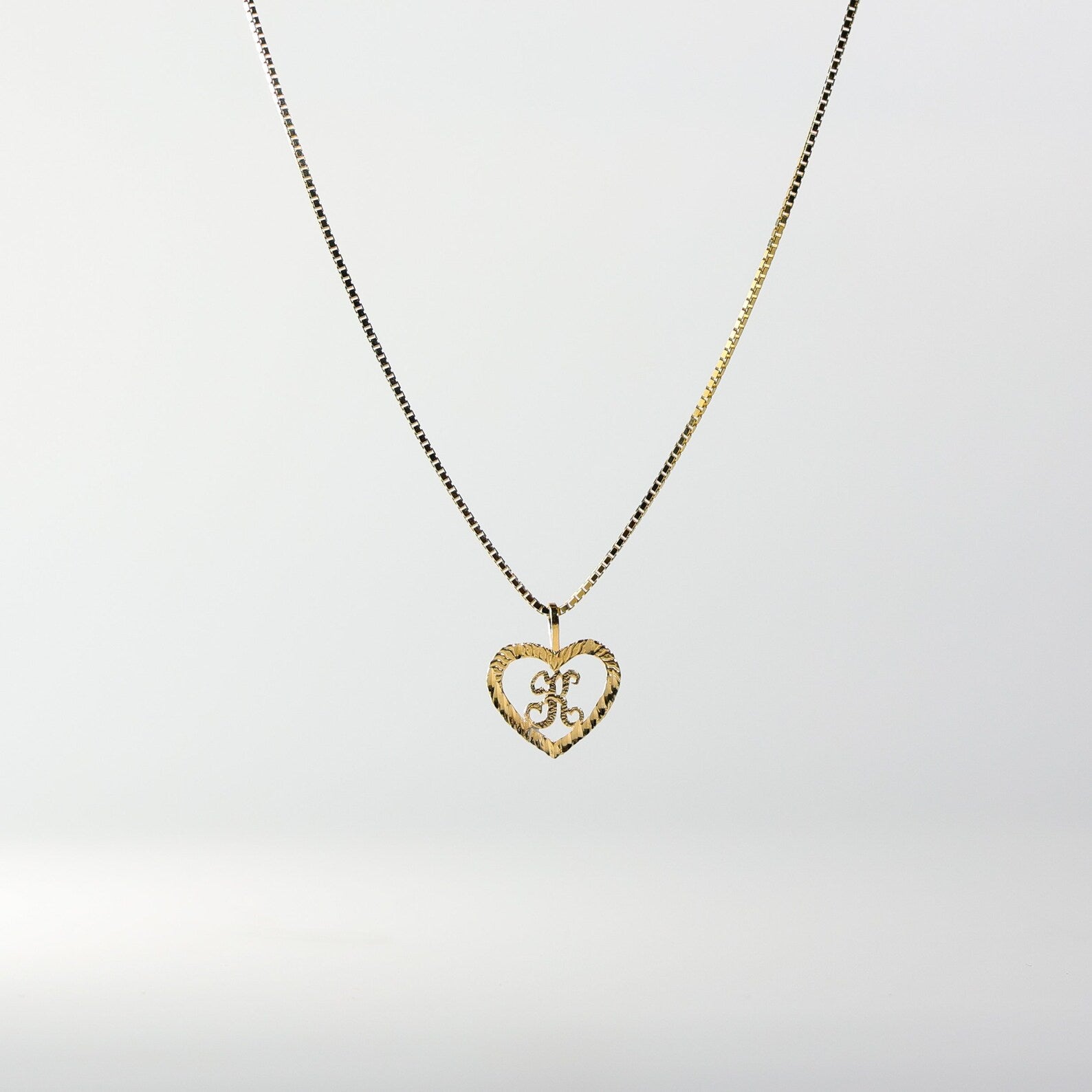 Gold Heart-Shaped Letter K Pendant | A-Z Pendants - Charlie & Co. Jewelry