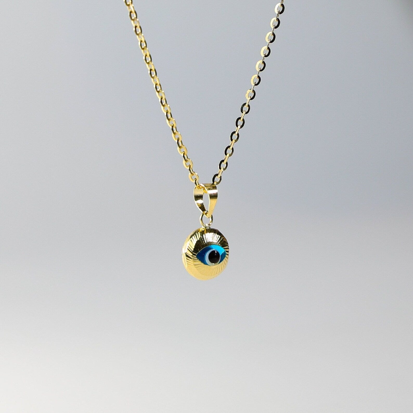 Gold Evil Eye Round Hamsa Pendant - Charlie & Co. Jewelry