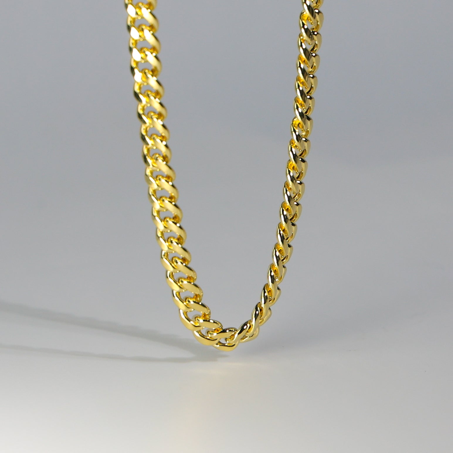 Gold 5.7mm Hollow Miami Cuban Chain Model-0541 - Charlie & Co. Jewelry