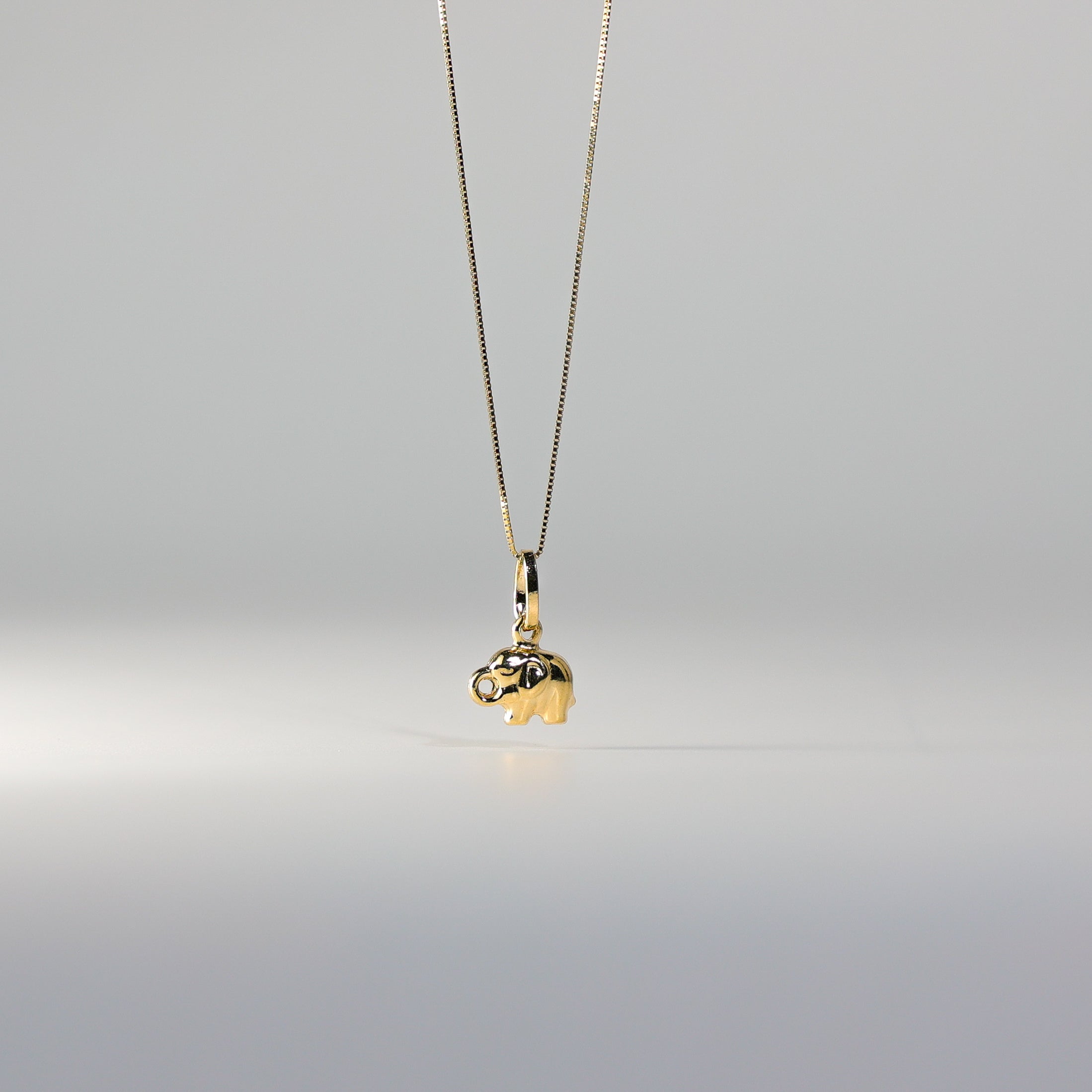 Gold Tiny Elephant Charm Model-493 - Charlie & Co. Jewelry