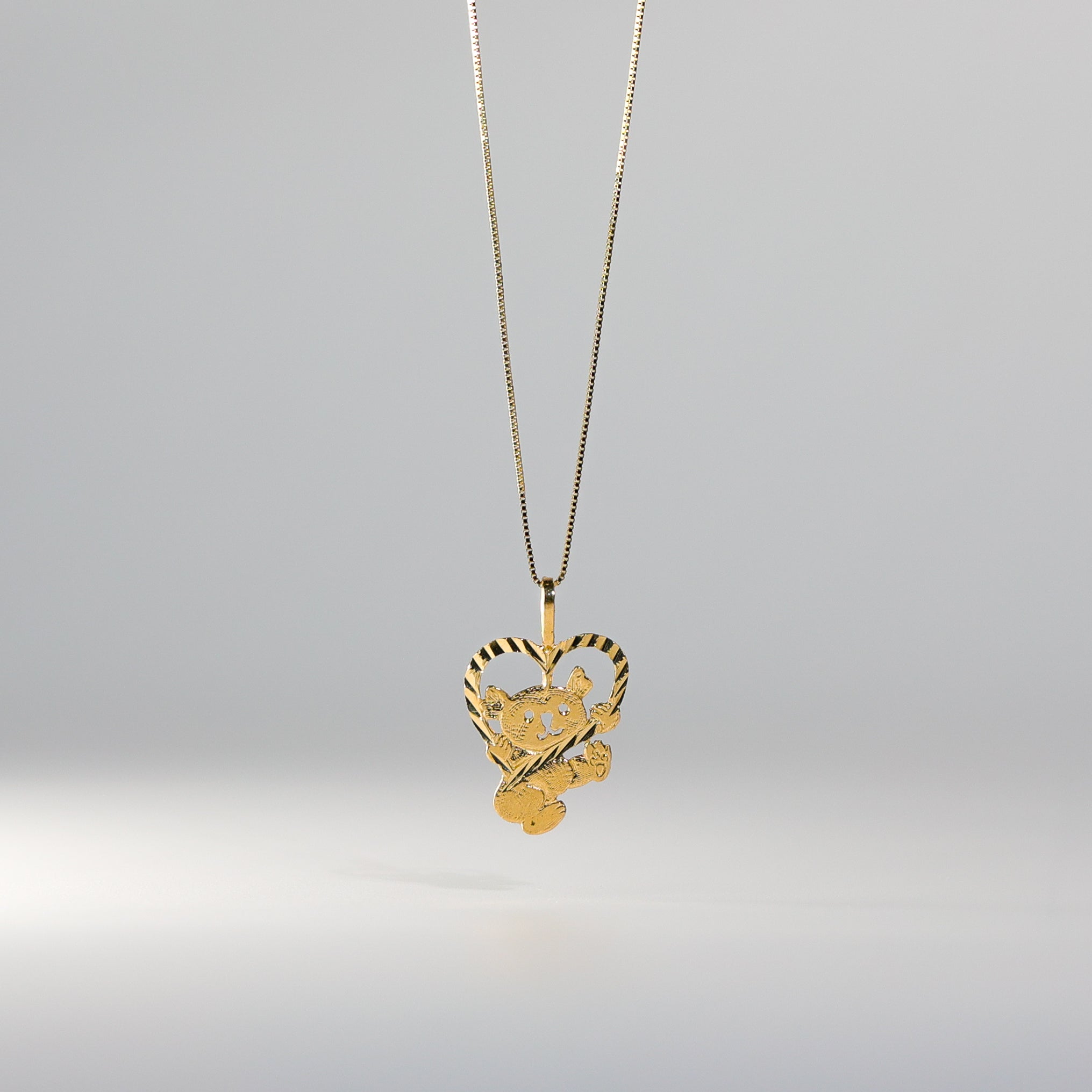 Gold Baby Bear with Heart Pendant Model-1655 - Charlie & Co. Jewelry