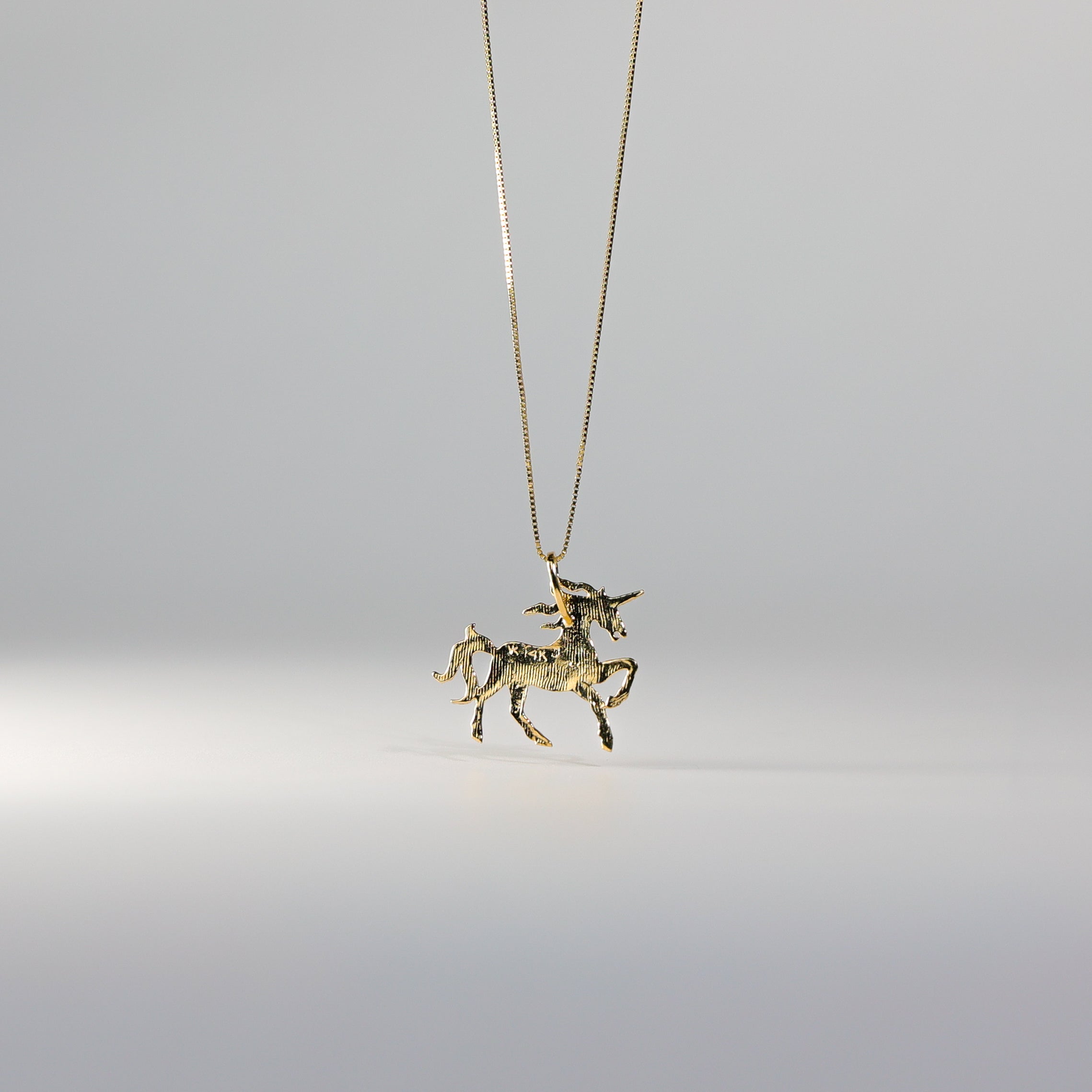 Gold Dainty Unicorn Pendant Model-1650 - Charlie & Co. Jewelry