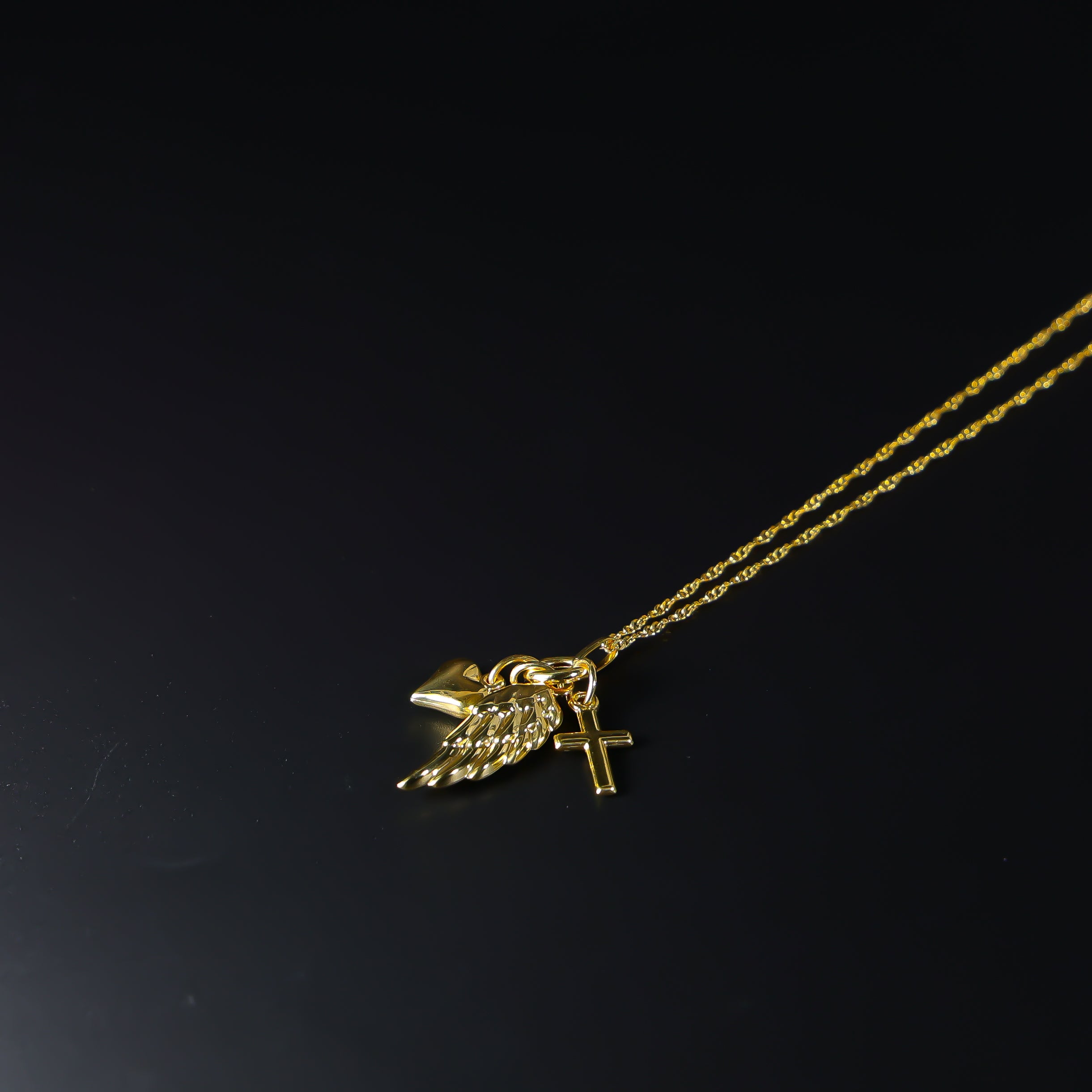 Gold Angel Wing Cross And Heart Necklace Model-NK0152 - Charlie & Co. Jewelry