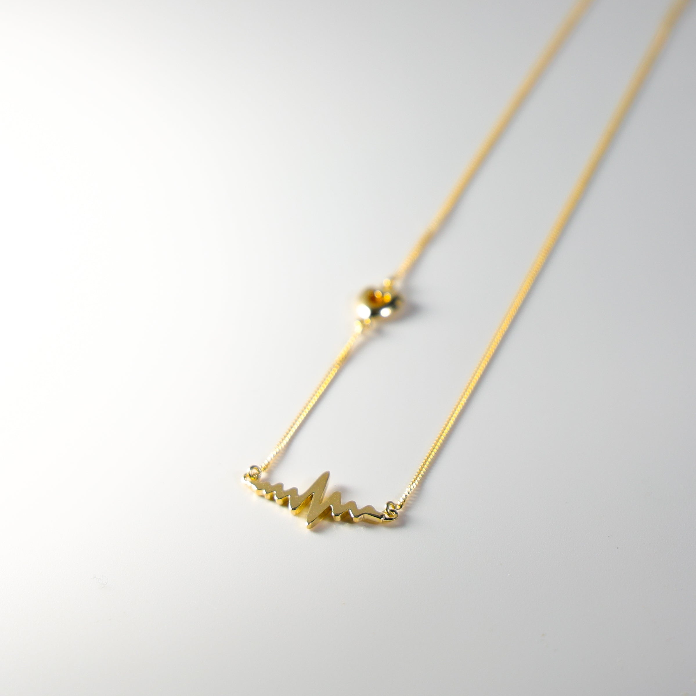 Gold Heartbeat Necklace Model-NK0319 - Charlie & Co. Jewelry