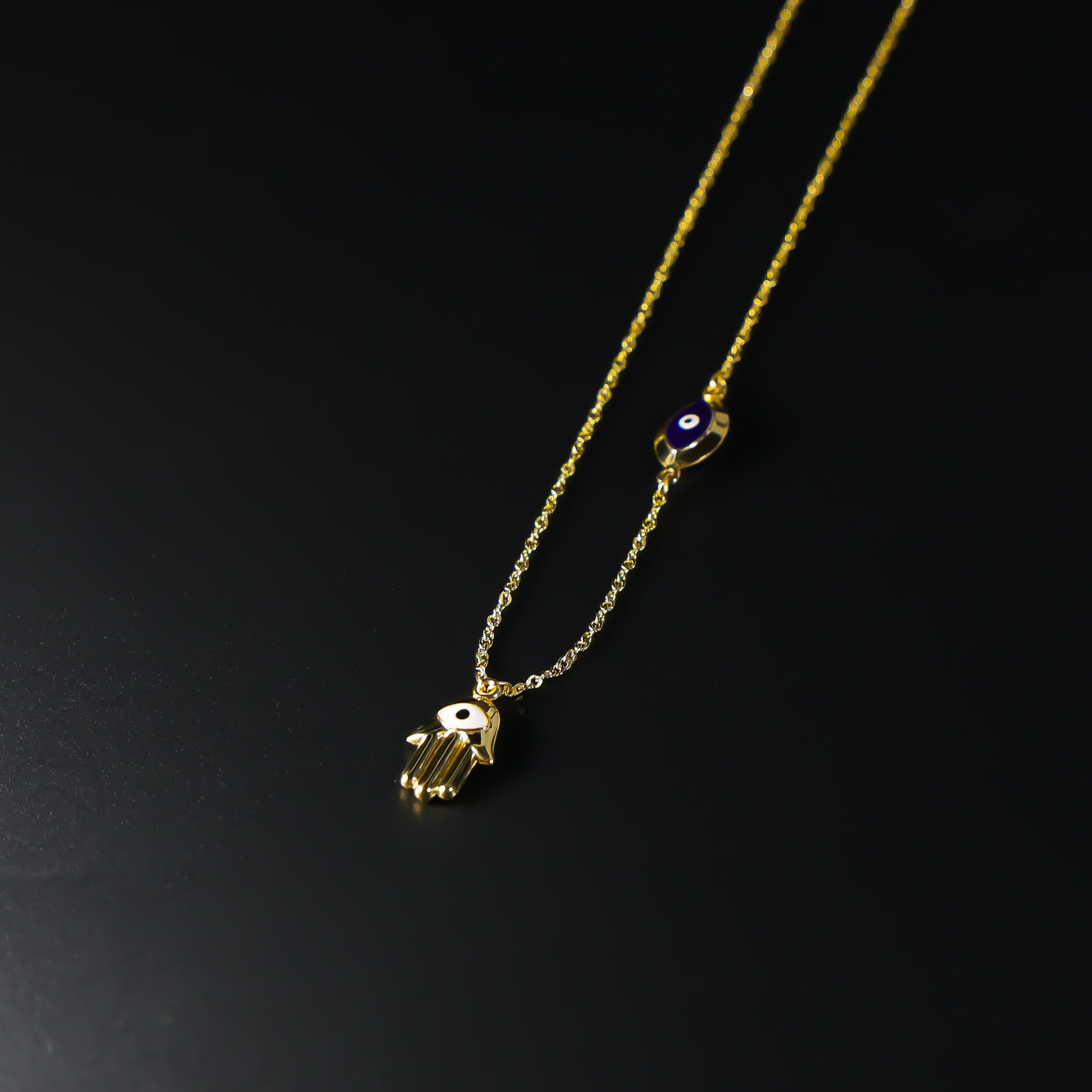 Gold Evil Eye Hamsa Charm Necklace Model-NK0153 - Charlie & Co. Jewelry
