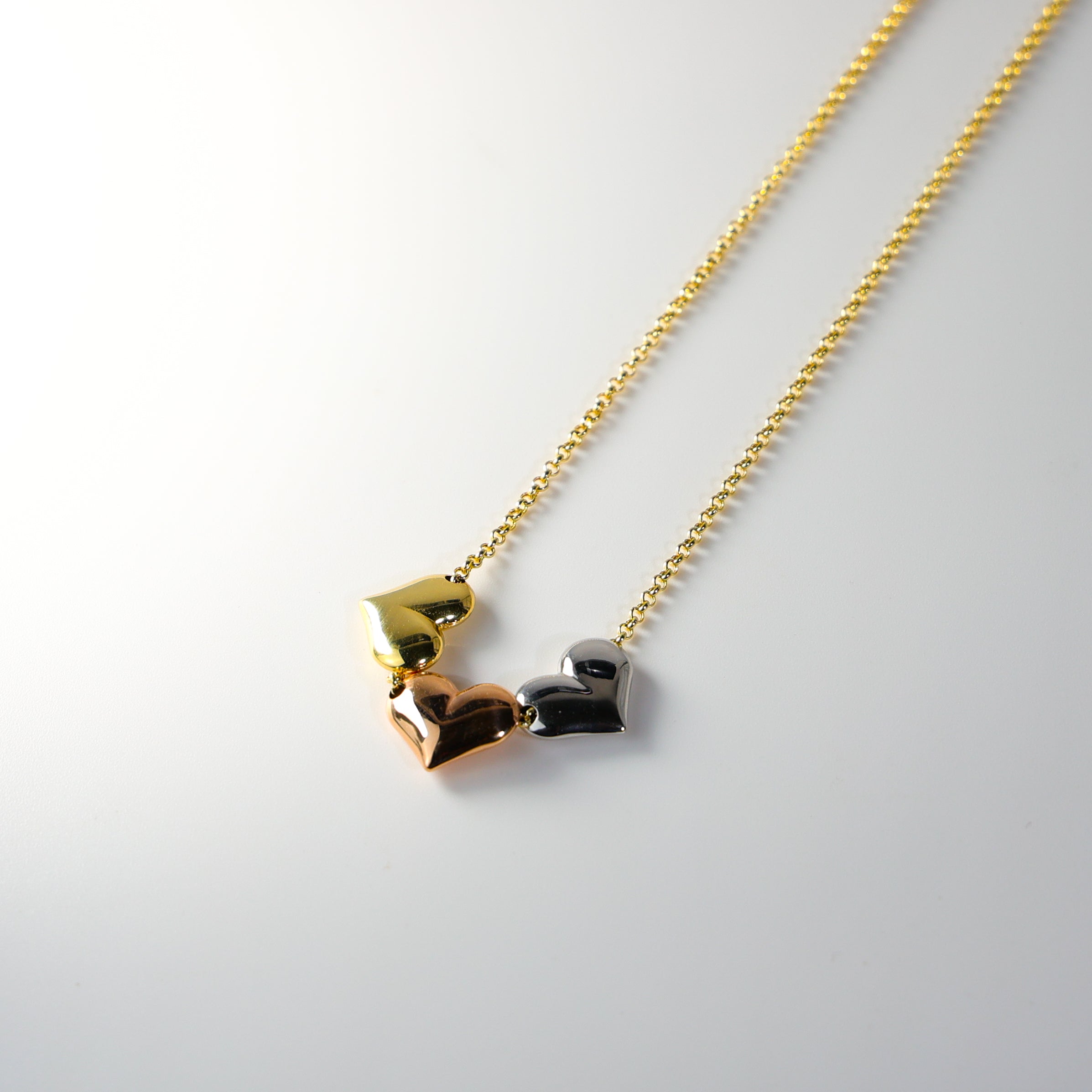 Gold Three Hearts Necklace Model-NK0069 - Charlie & Co. Jewelry