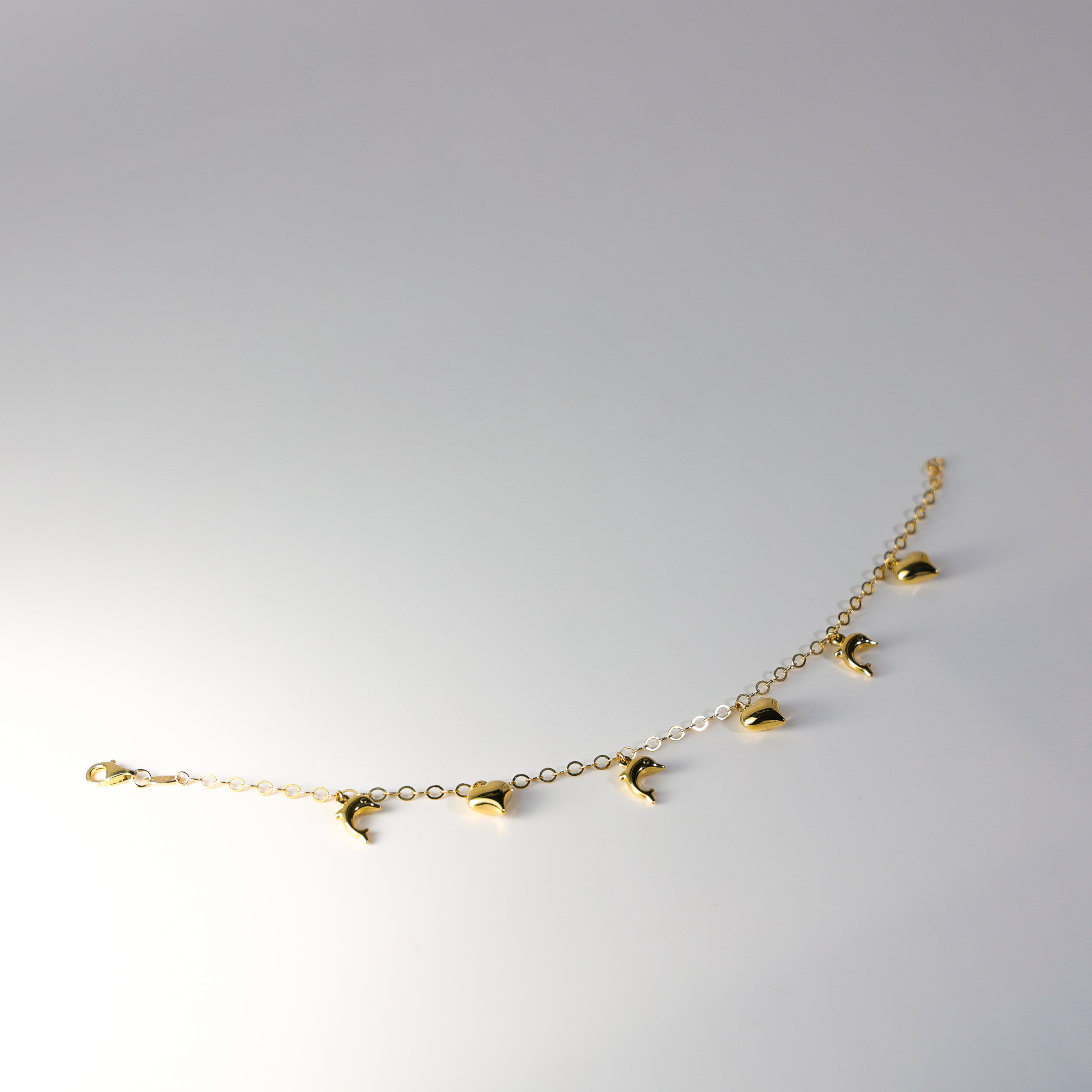 14K Gold Dolphin And Heart Bracelet Model-AB0771 - Charlie & Co. Jewelry