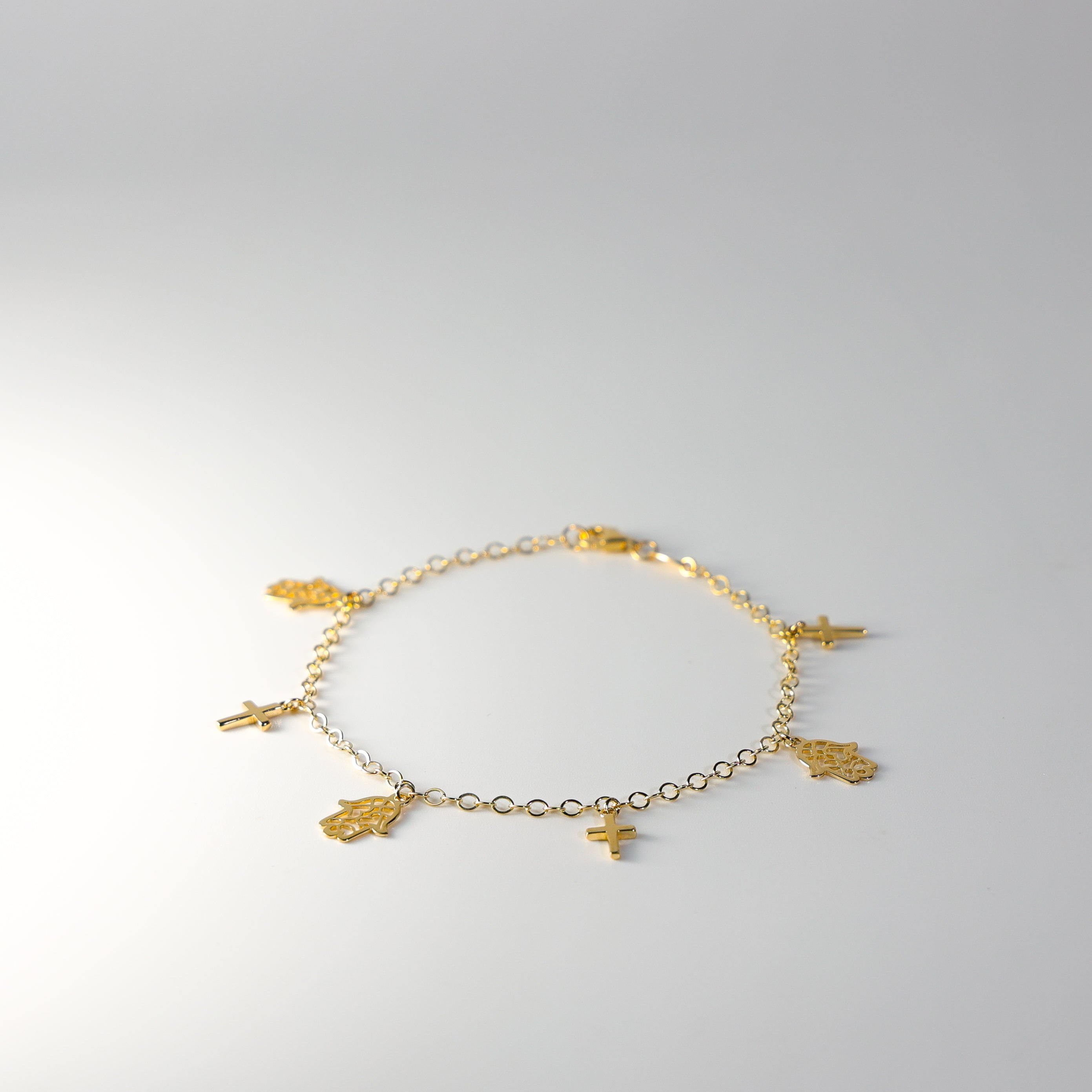14K Gold Hamsa And Cross Bracelet Model-AB0774 - Charlie & Co. Jewelry