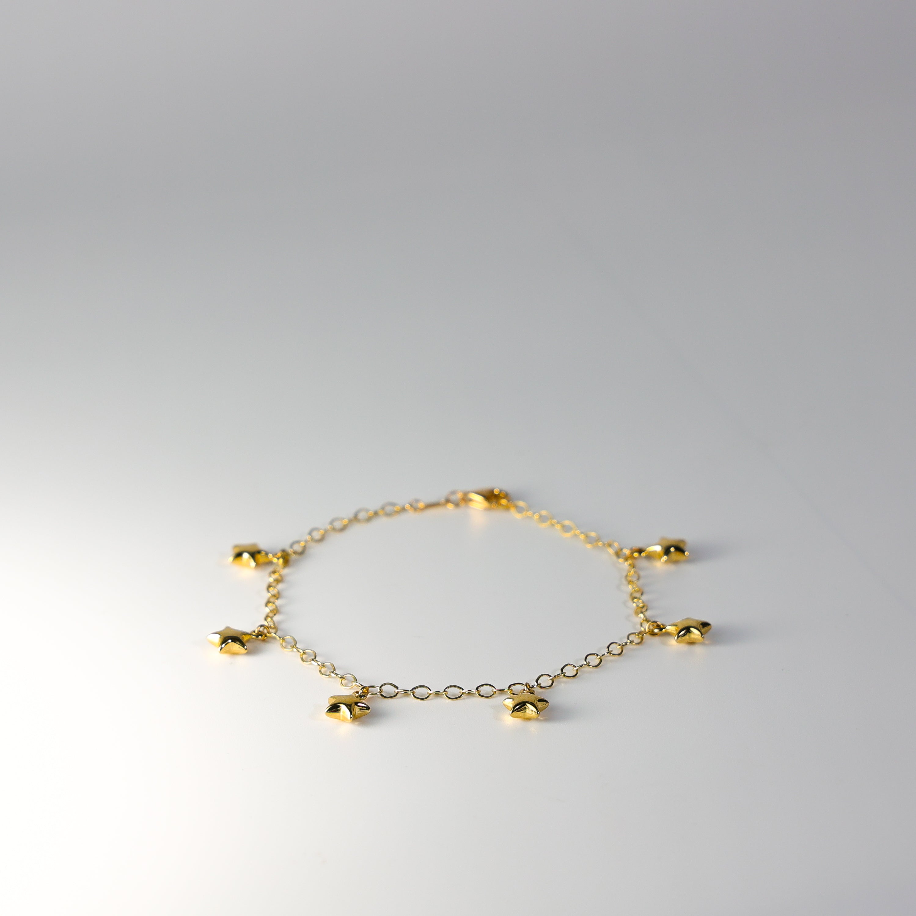 14K Gold Hanging Stars Bracelet Model-AB0772 - Charlie & Co. Jewelry