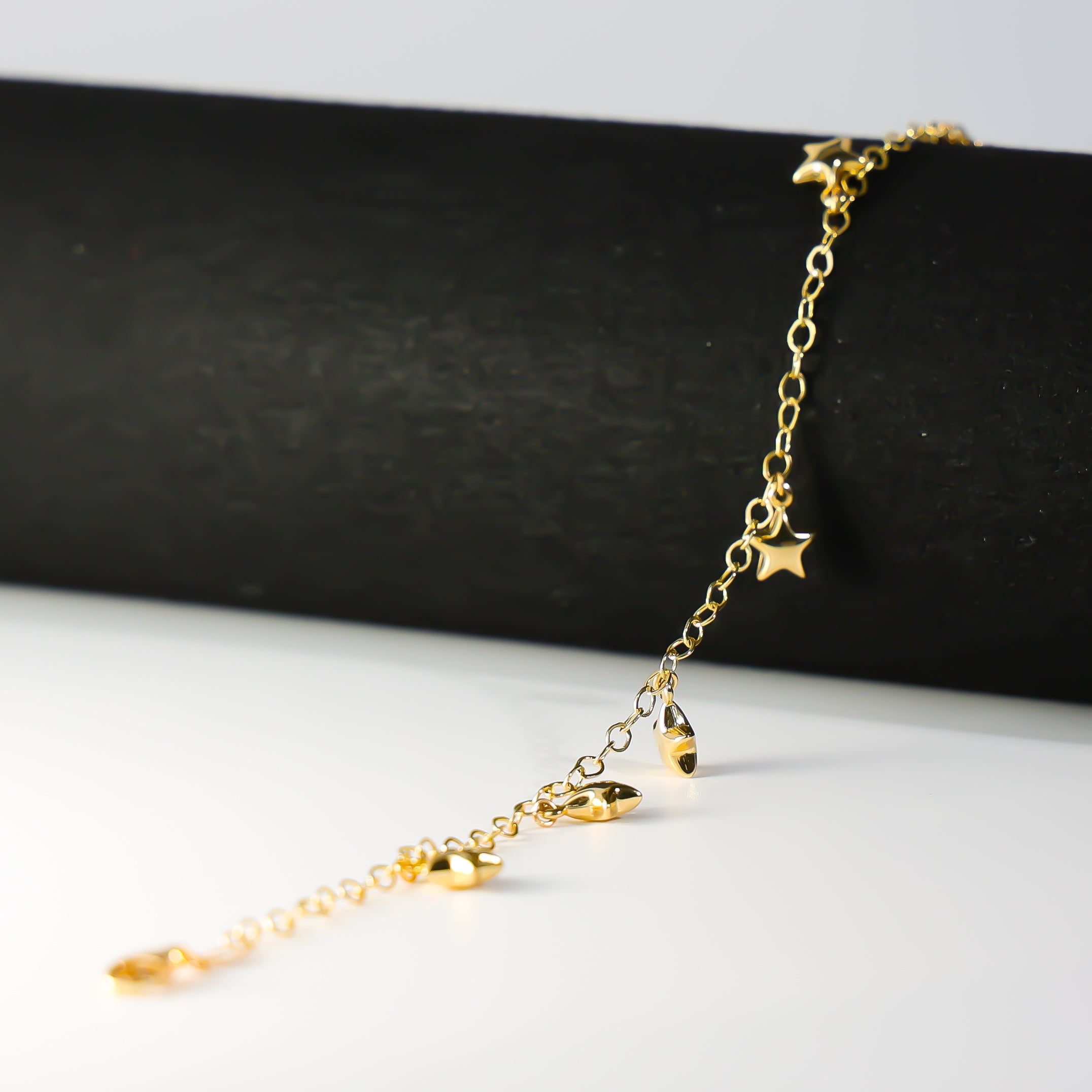 14K Gold Hanging Stars Bracelet Model-AB0772 - Charlie & Co. Jewelry