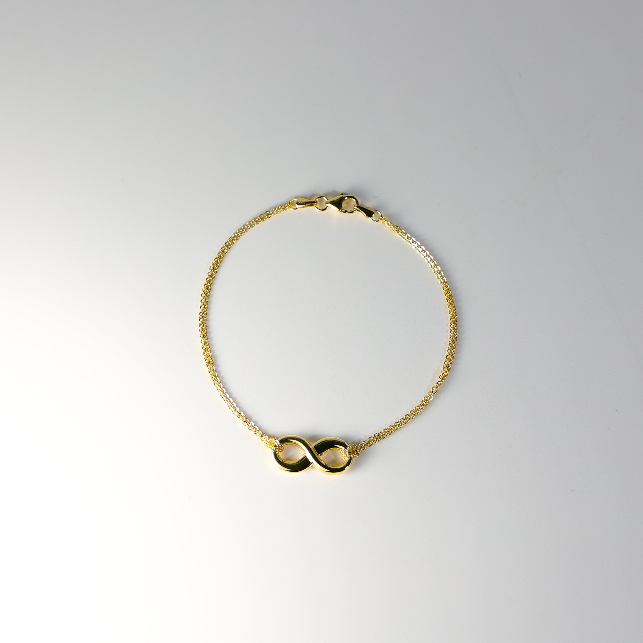 14K Gold Infinity Charm Bracelet Model-AB0538 - Charlie & Co. Jewelry