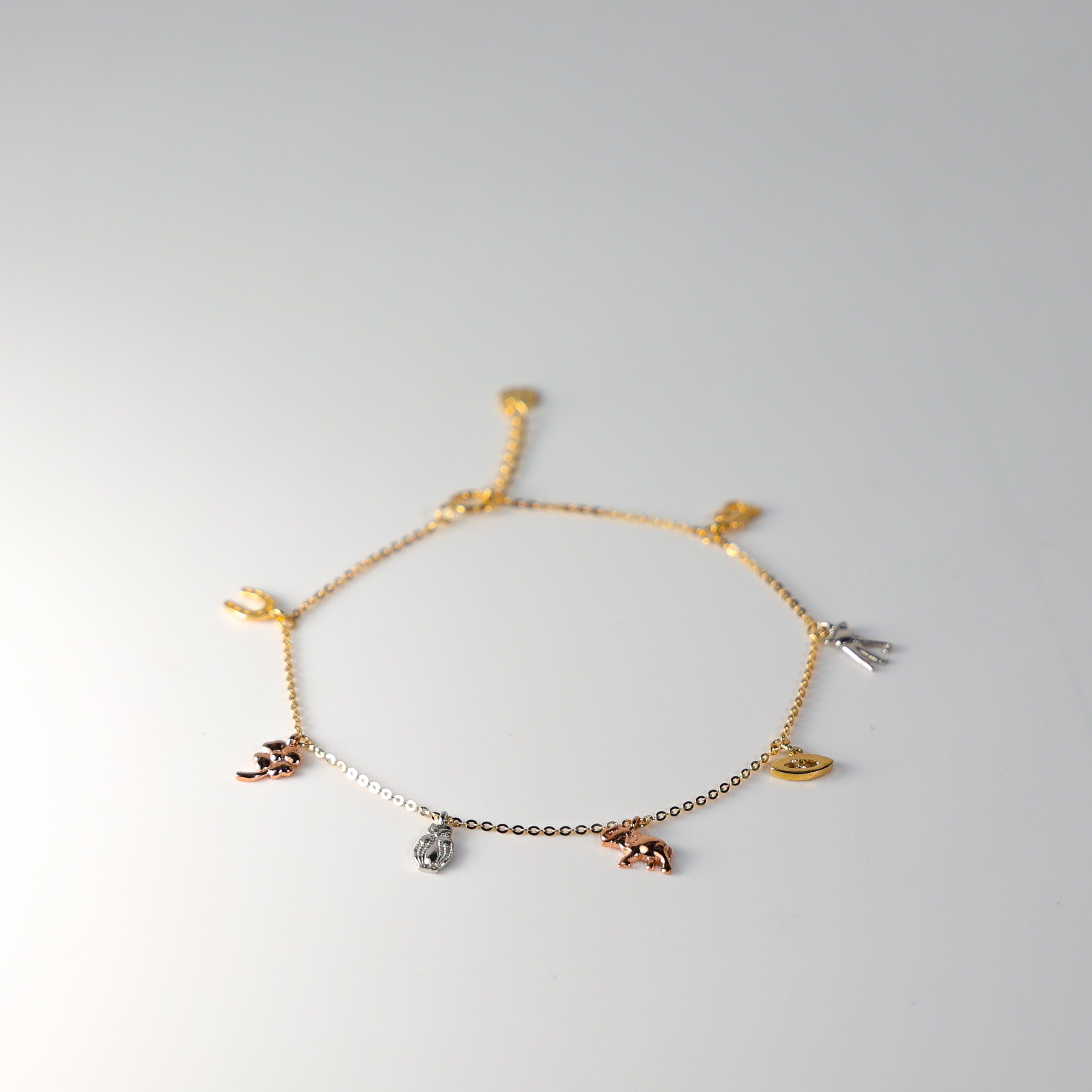 14K Gold Tiny Lucky Charm Bracelet Model-AB0550 - Charlie & Co. Jewelry