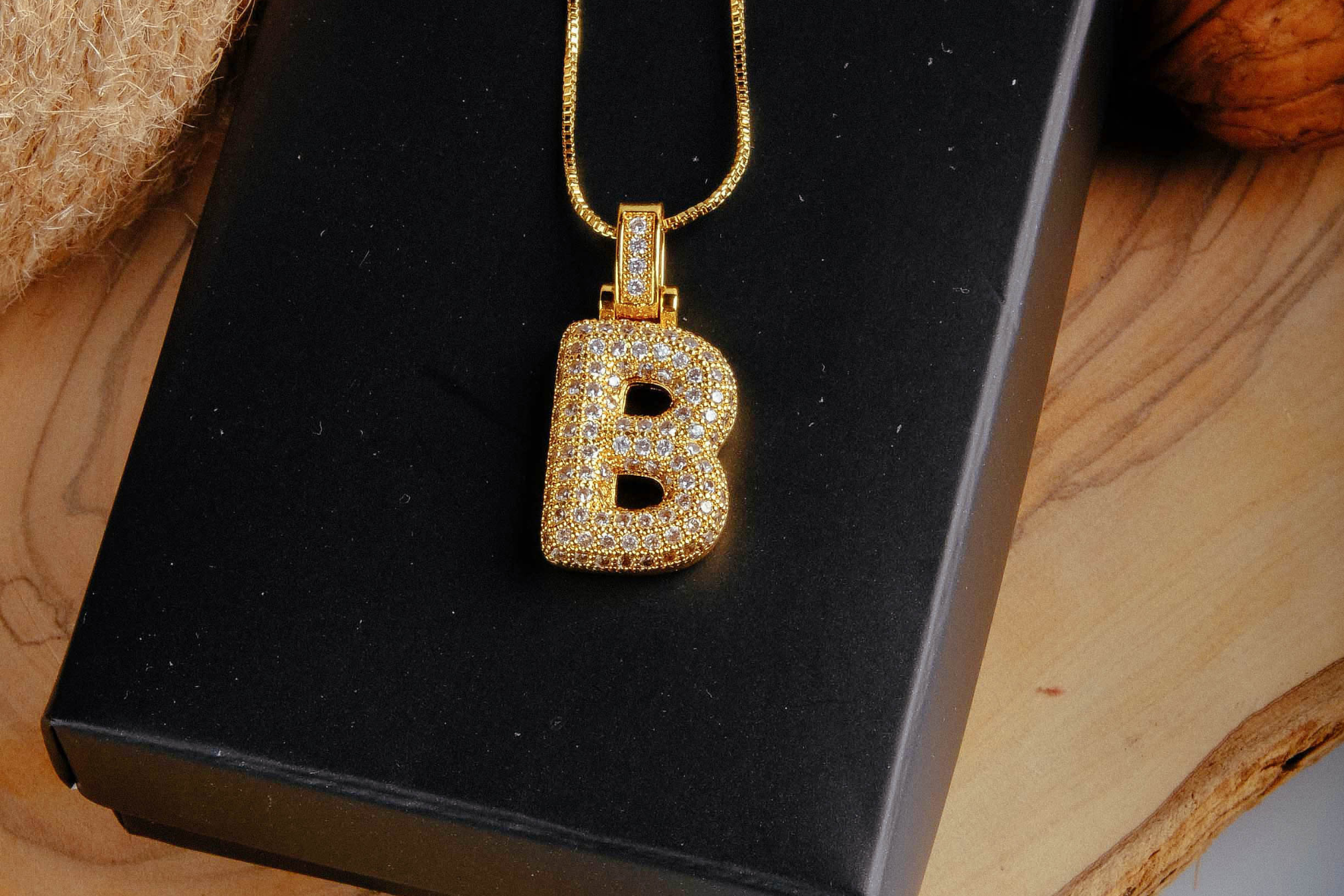 Why the Letter Pendants Trend is Back for the Holiday Season