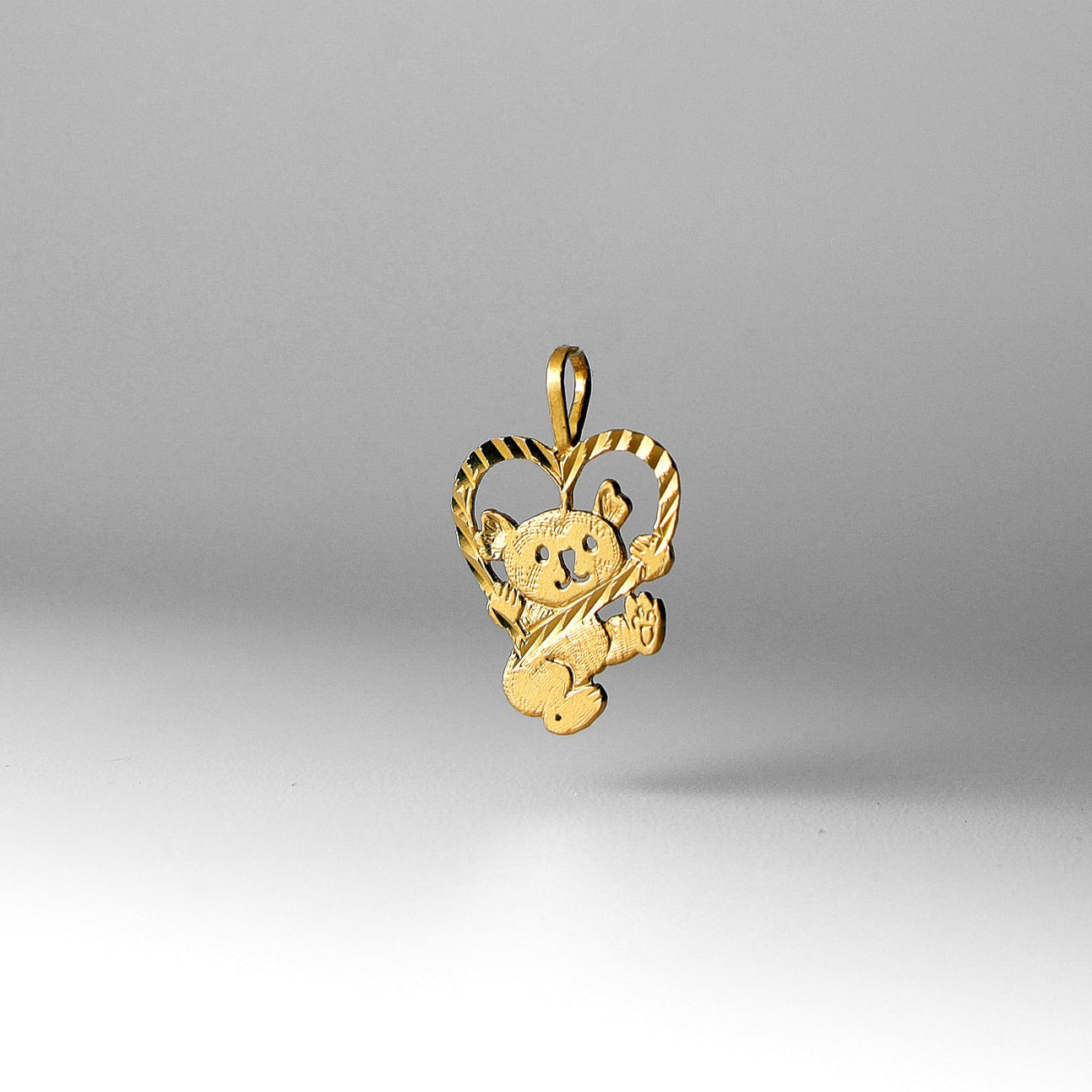 Gold Baby Bear with Heart Pendant Model-1655 - Charlie & Co. Jewelry