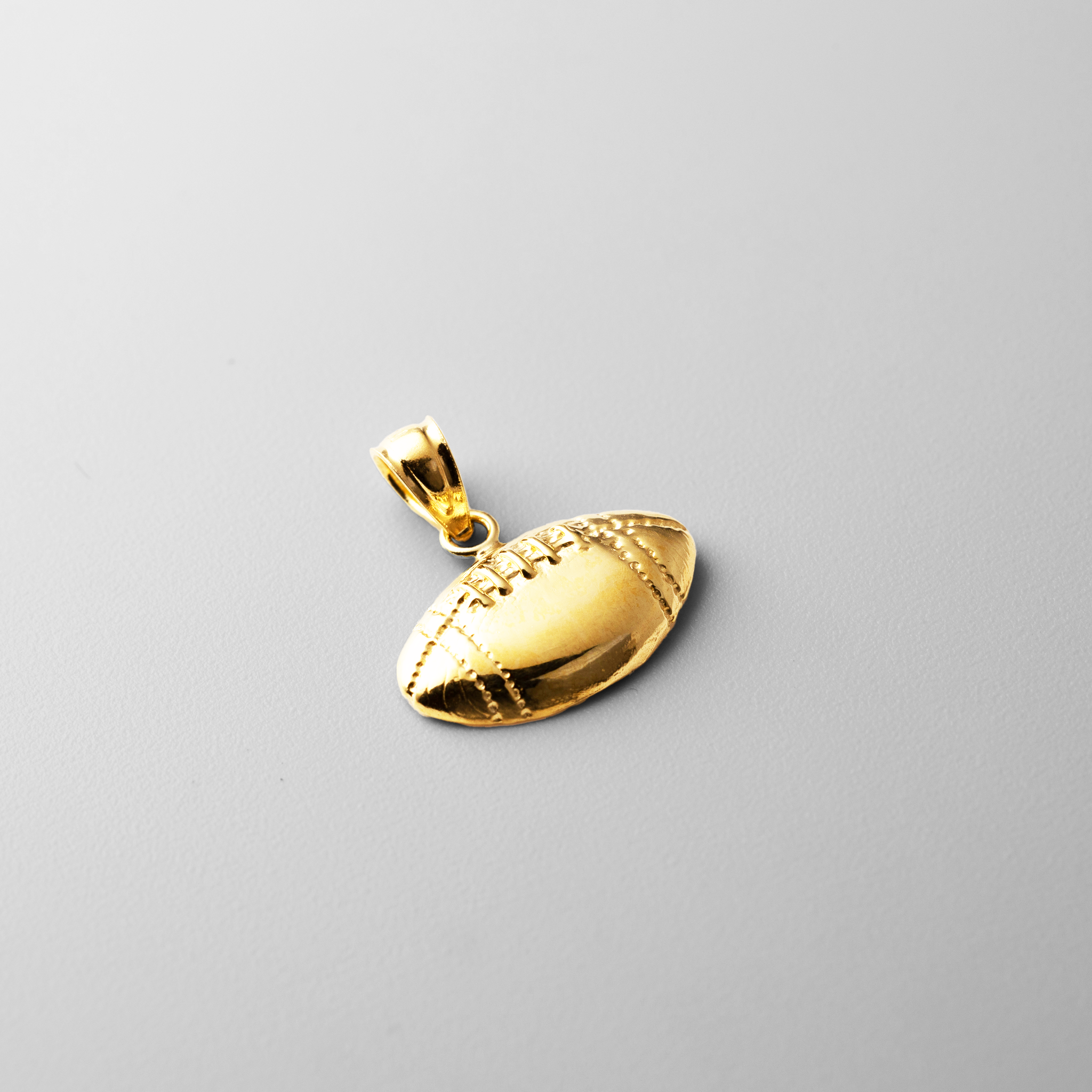 Gold Football Pendant Model-2336 - Charlie & Co. Jewelry