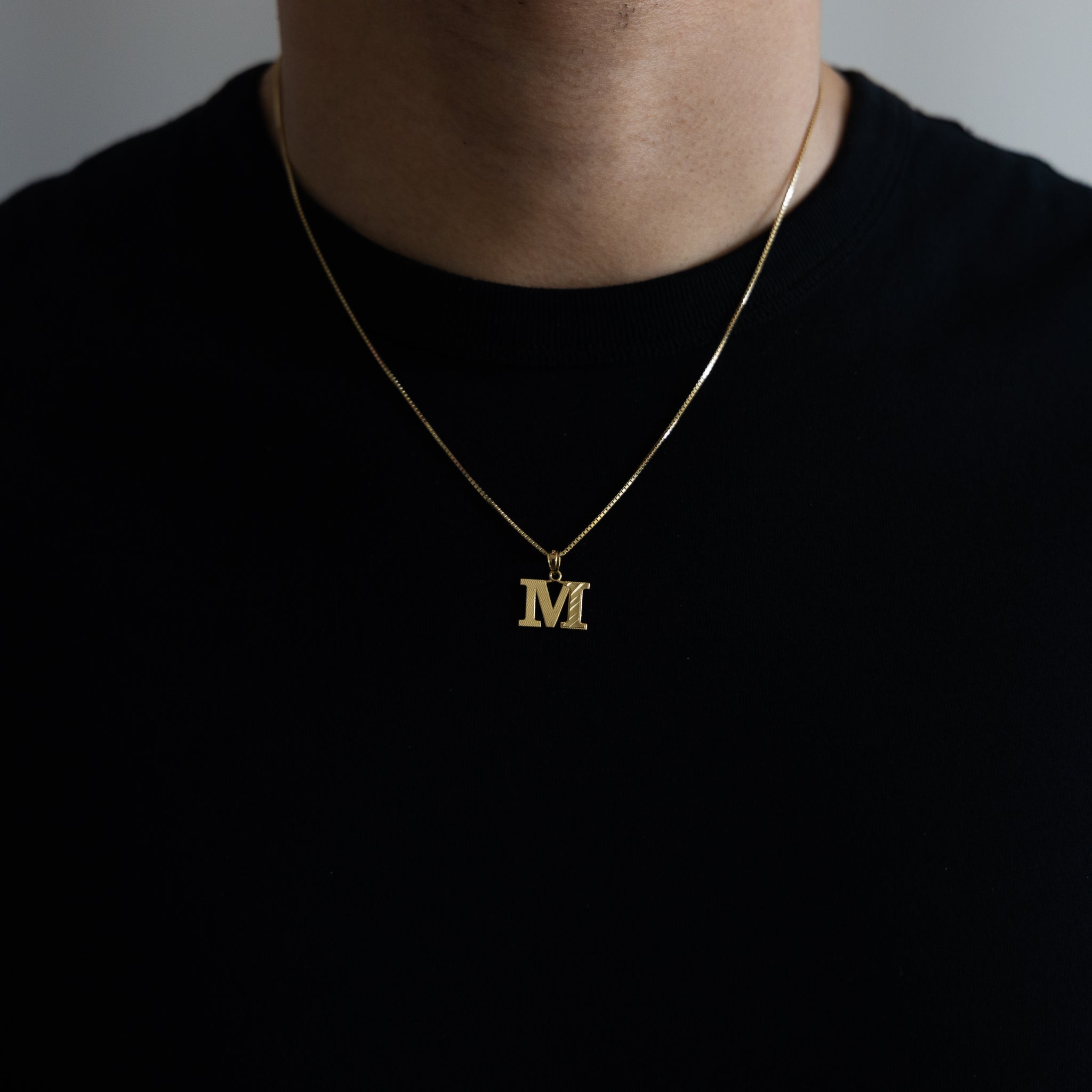Gold Bold Letter M Pendant | A-Z Pendants - Charlie & Co. Jewelry