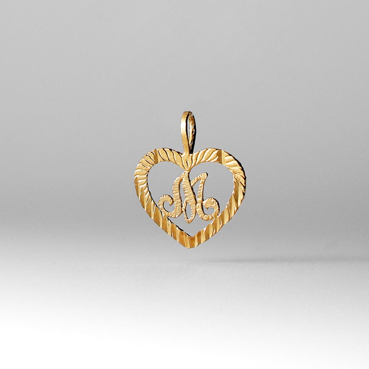 Gold Heart-Shaped Letter M Pendant | A-Z Pendants - Charlie & Co. Jewelry